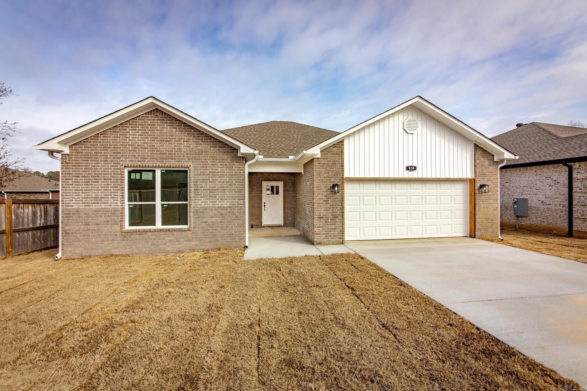 Welcome to this beautiful new construction patio home in Gated Community.   This stunning 3-bedroom, 2-bath patio home offering 1,500 square feet of thoughtfully designed living space in a desirable gated community. This brand-new home features an open floor plan that seamlessly connects the kitchen, dining, and living areas-perfect for both everyday living and entertaining.  The vaulted ceiling in the living room enhances the spacious feel, while luxury vinyl flooring flows throughout the home for a modern, low-maintenance finish.  The kitchen beautifully appointed with granite countertops, a tile backsplash, and plenty of cabinetry for storage.  The primary suite is privately located apart from the other bedrooms and features a large walk-in tile shower with generous closet space.  Enjoy outdoor living on the covered back patio, and appreciate added convenience with a separate laundry room and energy-efficient HVAC system for year-round comfort. This home offers style, efficiency, and comfort-all within a secure, gated community. Seller will pay for the first year of HOA/POA dues !!!