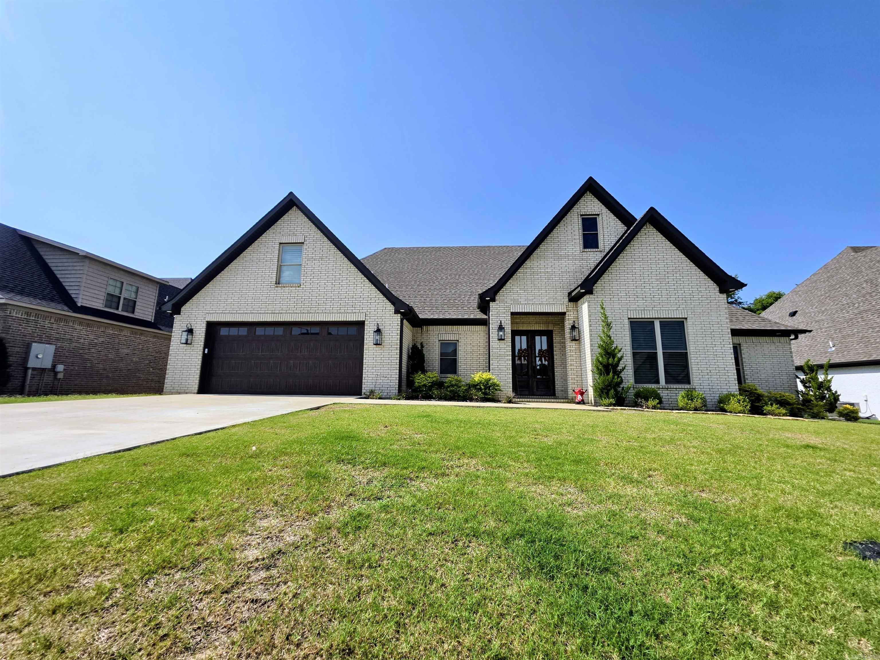 Beautiful immaculate home in Jamestown Manor offering approximately 2,950 sq ft+/- with 5 bedrooms and 3 full baths, including a full bath upstairs. This home features a spacious main-level layout with a fully finished bonus area above. Interior finishes include quartz countertops, stainless steel appliances, plantation shutters, and motorized blinds, giving the home a clean and modern feel throughout. The owner’s suite offers a relaxing soaker tub and a walk-in shower. The floor plan provides excellent storage space, well-designed living areas, and comfortable bedrooms. Situated on a .38-acre lot, this property delivers newer-style construction, extra bedrooms, and a practical 1.5-story design suited to a wide range of buyer needs.