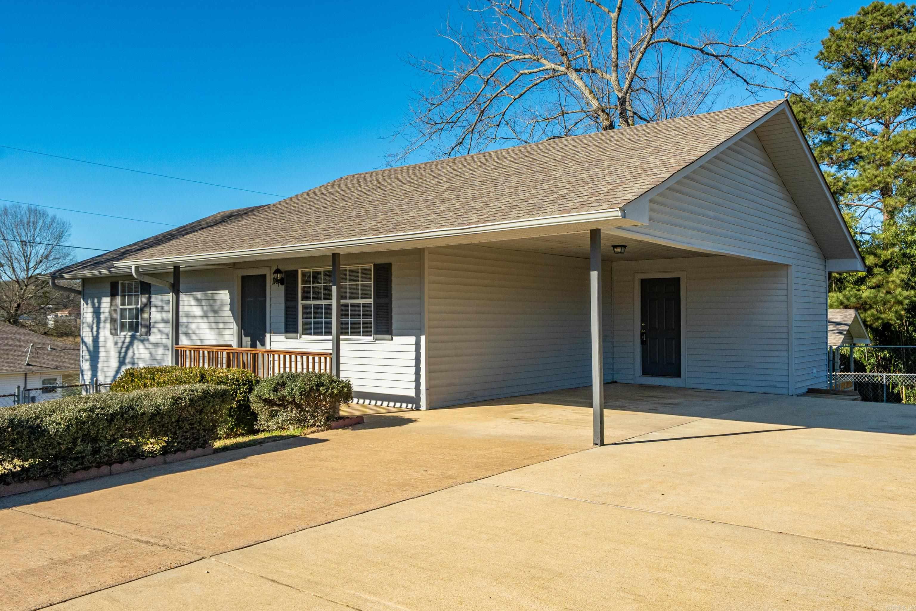 Move-in ready plus brand new windows in the Lake Hamilton School District. This immaculately maintained 2 bedroom, 2 bathroom home in Hot Springs, Arkansas is the kind of property buyers hope to find -- clean, fresh and ready to go.  Enjoy brand new windows, a fully fenced backyard, and a storage building for extra space. All in a quite, established neighborhood. The home is in excellent condition, making it perfect for buyers who want zero projects and a smooth move-in experience. Great location to all of Hot Springs conveniences.  Homes this clean and move-in ready do not last, schedule your showing today!