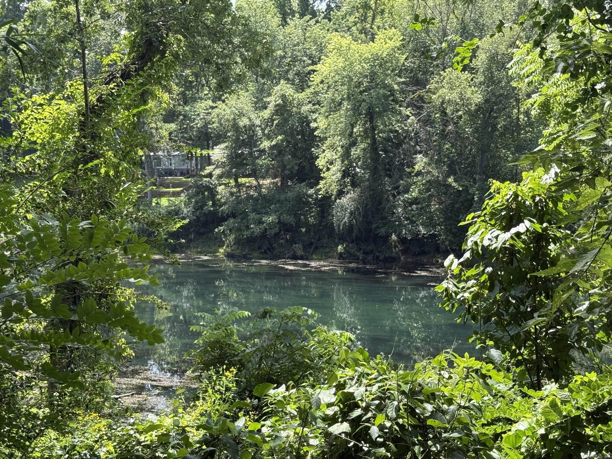 New Development inside the city limits of Heber Springs. River Wood Ranch has flat cleared lots and 19 lots along the river with trees. City sewer and water are available. Boat Ramp and Boat Dock will available by the first of 2027 for use by the residents of the subdivision. There are 8 lots that back up to the lake with views of the lake and Sugarloaf Mountain. Roads are currently gravel but as the lots are developed the roads will be paved.