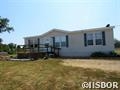 Neat and clean and move-in ready mobile home with a fully fenced back yard in Lake Hamilton School District.