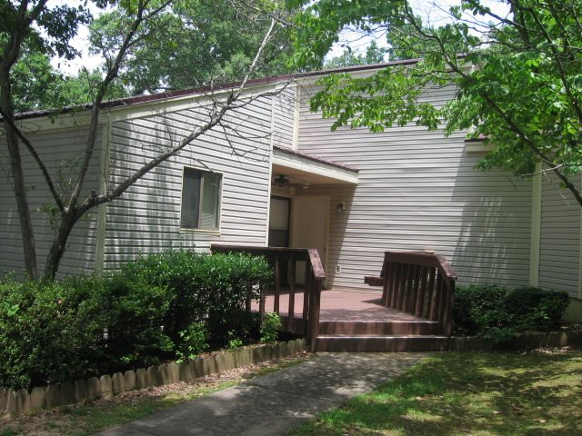 No-smoking, one-level townhouse, with 2 BR/2Ba with approx. 1200 sq. ft.  Kitchen is good size & appliances provided. Combo living-dining area is spacious.  Both bedrooms are quite large.  Master BR has walk-in closet.  Laundry room has storage.  Entry deck, and rear decks from bedrooms.  Some interior painting and updates being done currently by Owner.  Unfurnished rate is $750/mo.  Owner will consider some furniture at higher monthly rate.  Nice complex, convenient to amenities, shops, churches, banks.