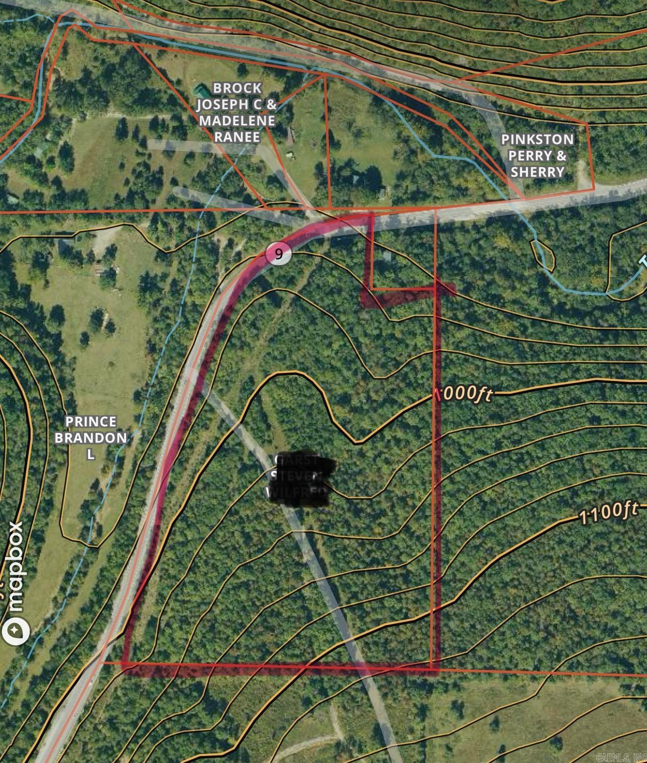 This unrestricted 20 +/-  acres is conveniently located on Highway 9 South just 17 minutes from the Stone County Courthouse Square in Mountain View.  Make your home on this wooded acreage with beautiful mountain views or enjoy the property for hunting. There is a drive through the wooded property that allows easy access  from the highway and provides access the the property beyond. Electric is on the property and public water is at the highway or you can drill a well.