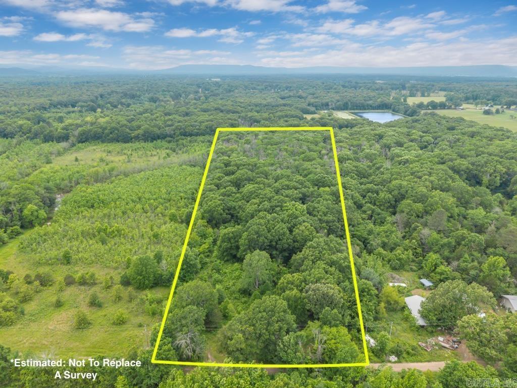 6.5 mostly wooded acres in the country in the Perry area! There is an electric pole and water meter hookup on the property. There is an old well but seller has never used it. Great spot for hunting or possibly build a home or place a mobile home! Property is in the AE floodzone.