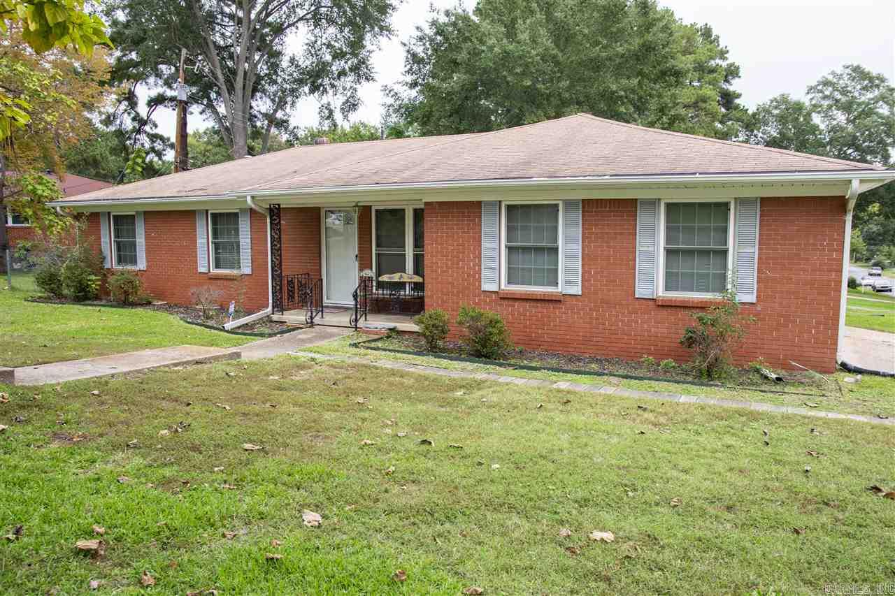 Nice 3 Bed 2bath, garage has been converted into a large den, eat in kitchen, formal living room, laundry room. Large front and side yard, side parking pads, all brick.Agents please see remarks