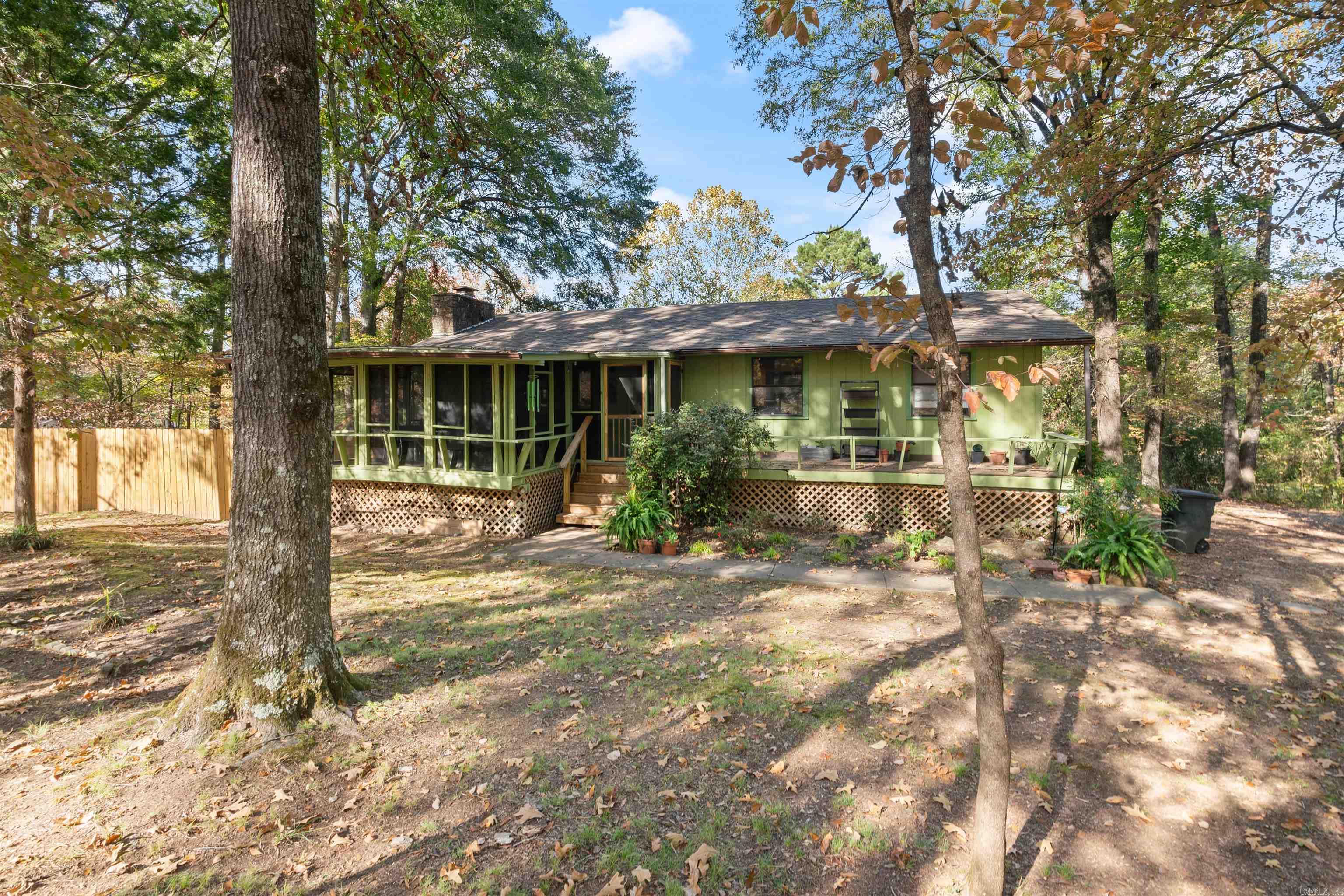 Price Change! Are you looking for the perfect home close to town but with a country feel? This home has it! 3 bedroom, 2.5 bath, additional living space or 4th bedroom, craft room, laundry room, storage AND 750 sq. ft of screened patio space! Enjoy that morning cup of coffee or evening glass of wine overlooking 2.65 private acres or in front of your Nickerson woodburning fireplace. Updates galore including New roof, flooring, privacy fenced play area and more! Private access to Beaverfork lake! What more could you want? RD Eligible! Agents see remarks!