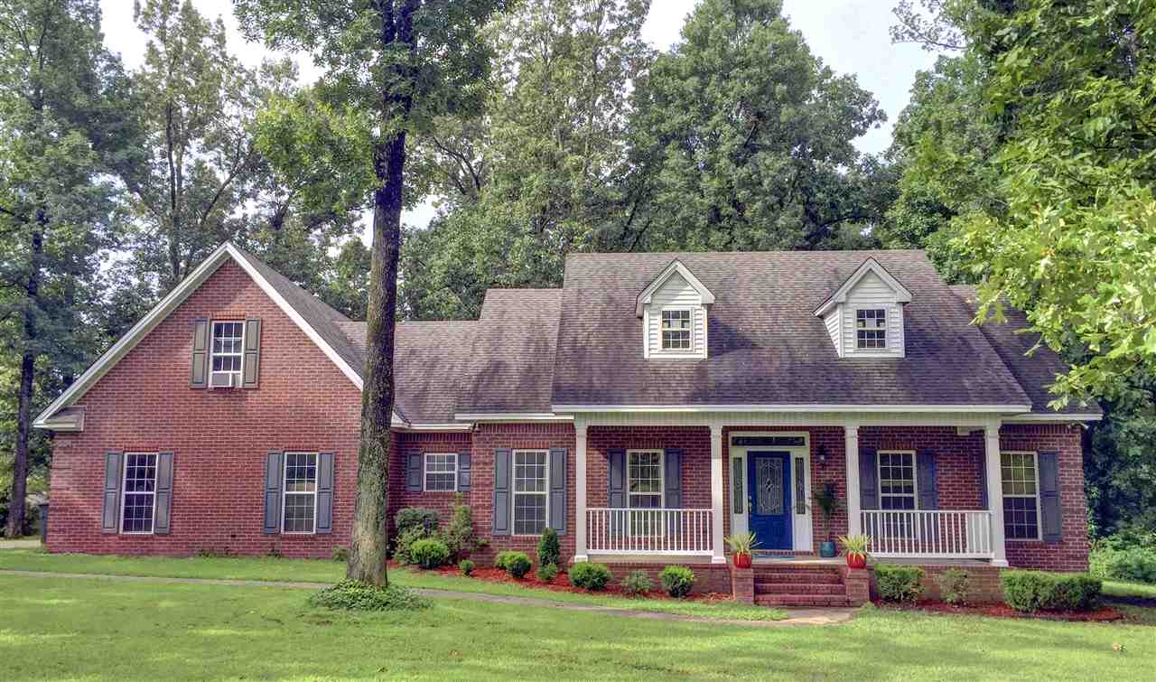Nestled in a private cove surrounded by beautiful mature trees, this home is the perfect getaway at the end of the day! Sitting on 1.23 acres with 3BR, 2.5 BA PLUS a bonus room, screened in back porch, large family room with electric fireplace, large eat in kitchen with pull out cabinet storage, Corian countertops and breakfast bar, formal dining room right off of foyer, large mud room area off of garage, large master suite with walk in shower and jetted tub and so much more! This home is a must see!!!!