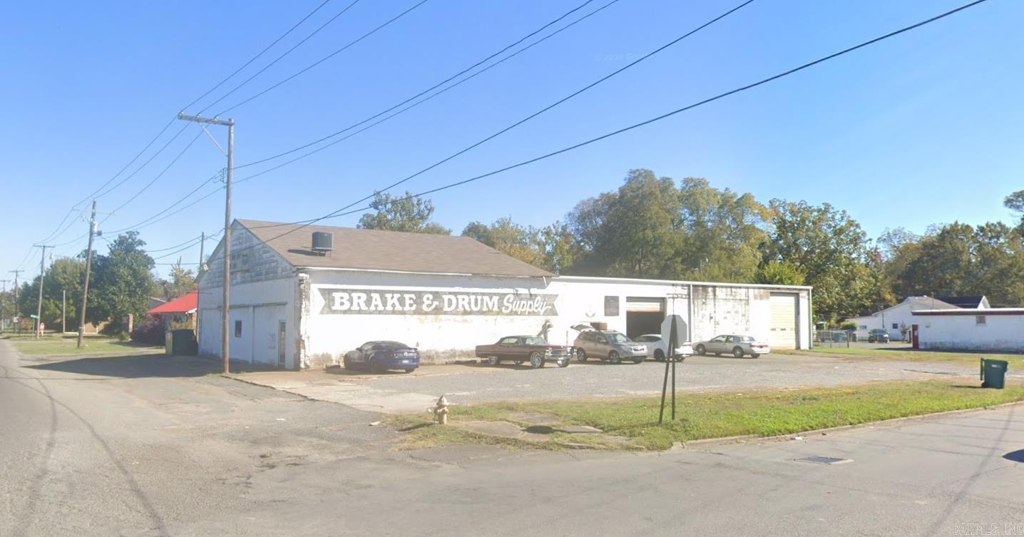 Automotive repair facility available for sale at 1714 W. 6th Street in Pine Bluff. The property features two roll-up bay doors, a reception and parts area, two restrooms, a large main shop area, and additional private workspaces suitable for a variety of automotive and mechanical uses.  Included in the sale are existing vehicle lifts, shop machinery, shelving, and other equipment, providing a solid foundation for a new owner to renovate and customize the facility to their needs. While the property would benefit from cleaning, cosmetic improvements, and deferred maintenance, it presents an affordable opportunity to acquire a functional automotive shop with valuable equipment already in place.