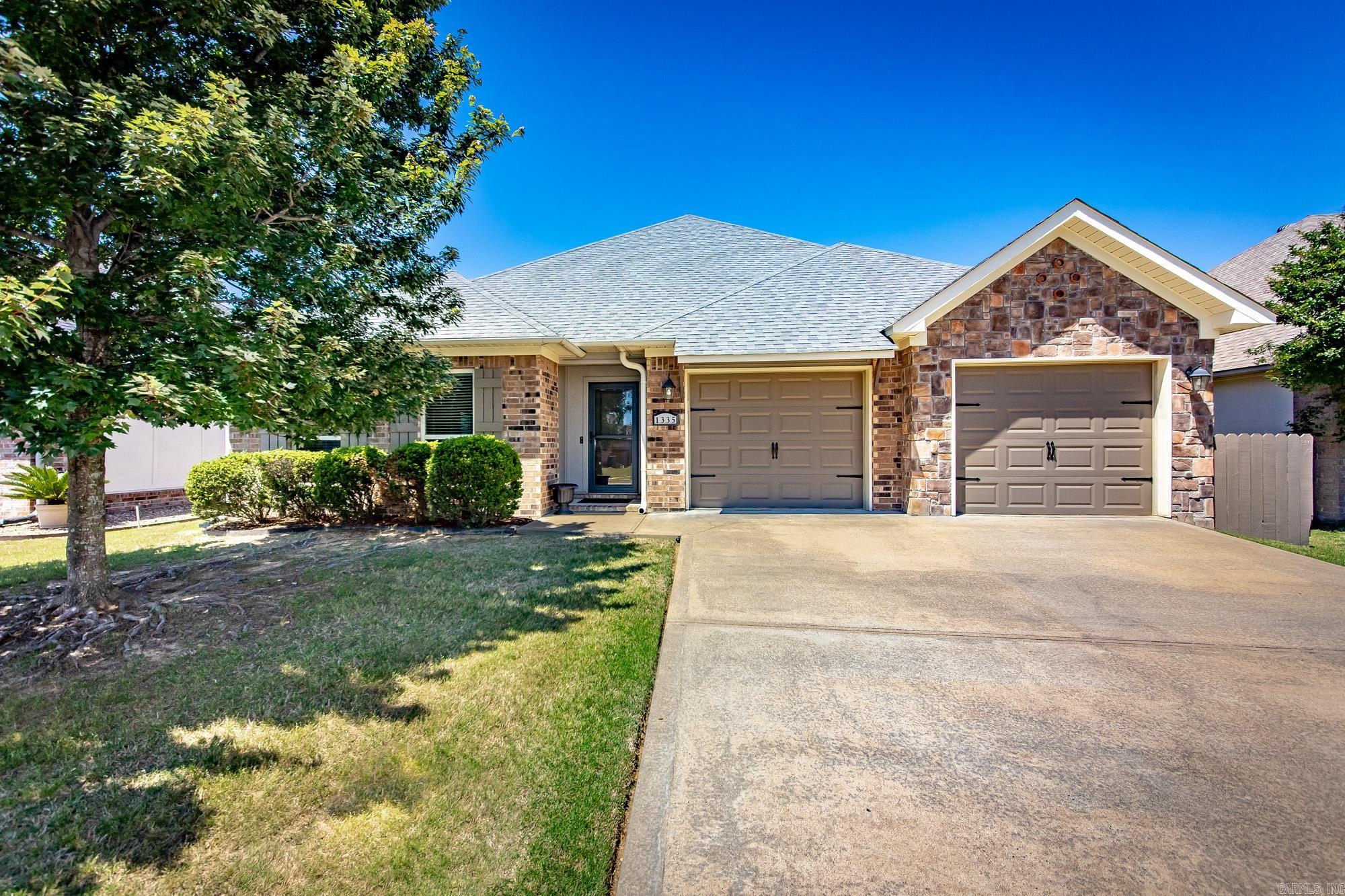 Step into comfort and style with this beautifully updated single-story home offering just under 1,800 square feet of thoughtfully designed living space. Featuring 3 spacious bedrooms and 2 full bathrooms, this home combines modern updates with warm, inviting character throughout.  The open-concept floor plan creates the perfect space for everyday living and entertaining, seamlessly connecting the dining area, living room, and kitchen. The kitchen is a standout with granite countertops, a large island, and plenty of prep and gathering space, while the living area showcases stunning vaulted ceilings accented with custom wood beams that add charm and architectural detail.  Recent updates include fresh interior paint, newer carpet, a newly installed fence, and a professionally repainted and sealed exterior, giving this home a fresh, move-in ready feel from top to bottom.  Outside, enjoy a fully fenced backyard that backs up to peaceful green space, creating added privacy and a relaxing setting for morning coffee, weekend gatherings, or quiet evenings under the stars. HOA provides lawn care and sprinkler maintenance.