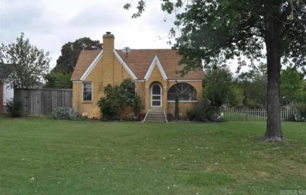 Timeless Craftsmanship meets Modern convenience in this beautifully restored 1922 Craftsman Cottage! Full of charm+ thoughtfully updated, this home offers 3 bedrooms, a dedicated office, 3 full baths+ a 1/2 bath (in garage) on a beautiful lot. The heart of the home features a spacious Den w/Fireplace,+original hardwood floors(That were milled from tress harvested directly from the land) The kitchen features Mexican terracotta tile floors (that carry over to the hallway+down stairs bath) a copper farmhouse sink with upgraded fixtures,+ 2 original restored kitchen cabinets.The stainless Steel appliances include a New gas range(2023), refrigerator (2020)+dishwasher(2026).Through out the home you'll find stunning custom woodwork, including a handcrafted FP Mantel, original front door,+ interior French doors.Upstairs was updated in 2021, with Beautiful LVP flooring,+ updated Bathrooms! 2 HVAC systems updated in 2023, New roof+gutters 2025, commercial- grade Water heater 2025! Massive deck (2019) includes a Hot Tub(2025) Kid's clubhouse(2020)+Storage shed(2018) Convey with this amazing property!! Exceptional Craftsman Cottage is ready for its next chapter!!**Updated pictures to follow**