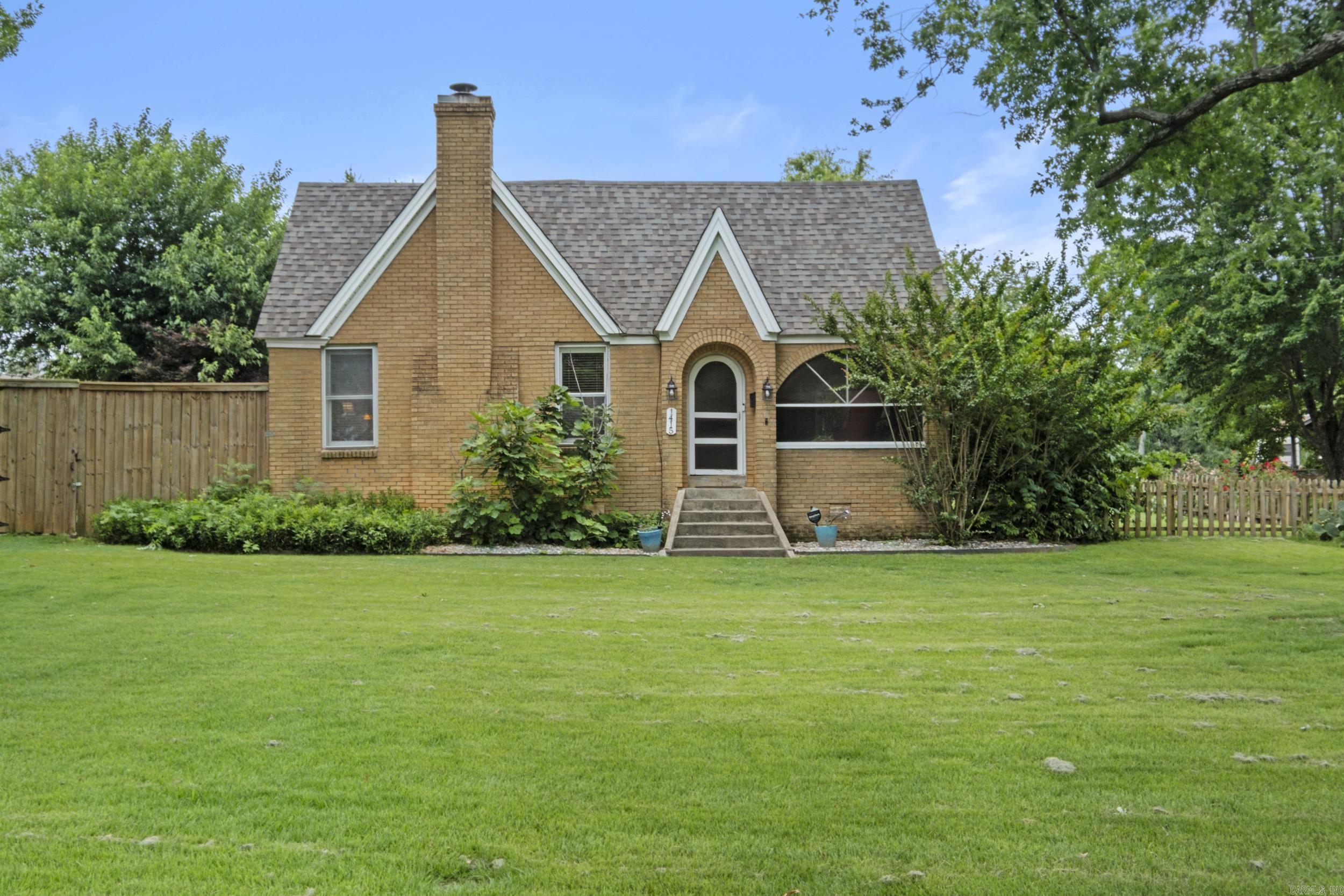 Timeless Craftsmanship meets Modern convenience in this beautifully restored 1922 Craftsman Cottage! Full of charm+ thoughtfully updated, this home offers 3 bedrooms, a dedicated office, 3 full baths+ a 1/2 bath (in garage) on a beautiful lot. The heart of the home features a spacious Den w/Fireplace,+original hardwood floors(That were milled from tress harvested directly from the land) The kitchen features Mexican terracotta tile floors (that carry over to the hallway+down stairs bath) a copper farmhouse sink with upgraded fixtures,+ 2 original restored kitchen cabinets.The stainless Steel appliances include a New gas range(2023), refrigerator (2020)+dishwasher(2026).Through out the home you'll find stunning custom woodwork, including a handcrafted FP Mantel, original front door,+ interior French doors.Upstairs was updated in 2021, with Beautiful LVP flooring,+ updated Bathrooms! 2 HVAC systems updated in 2023, New roof+gutters 2025, commercial- grade Water heater 2025! Massive deck (2019) includes a Hot Tub(2025) Kid's clubhouse(2020)+Storage shed(2018) Convey with this amazing property!! Exceptional Craftsman Cottage is ready for its next chapter!!**Updated pictures to follow**