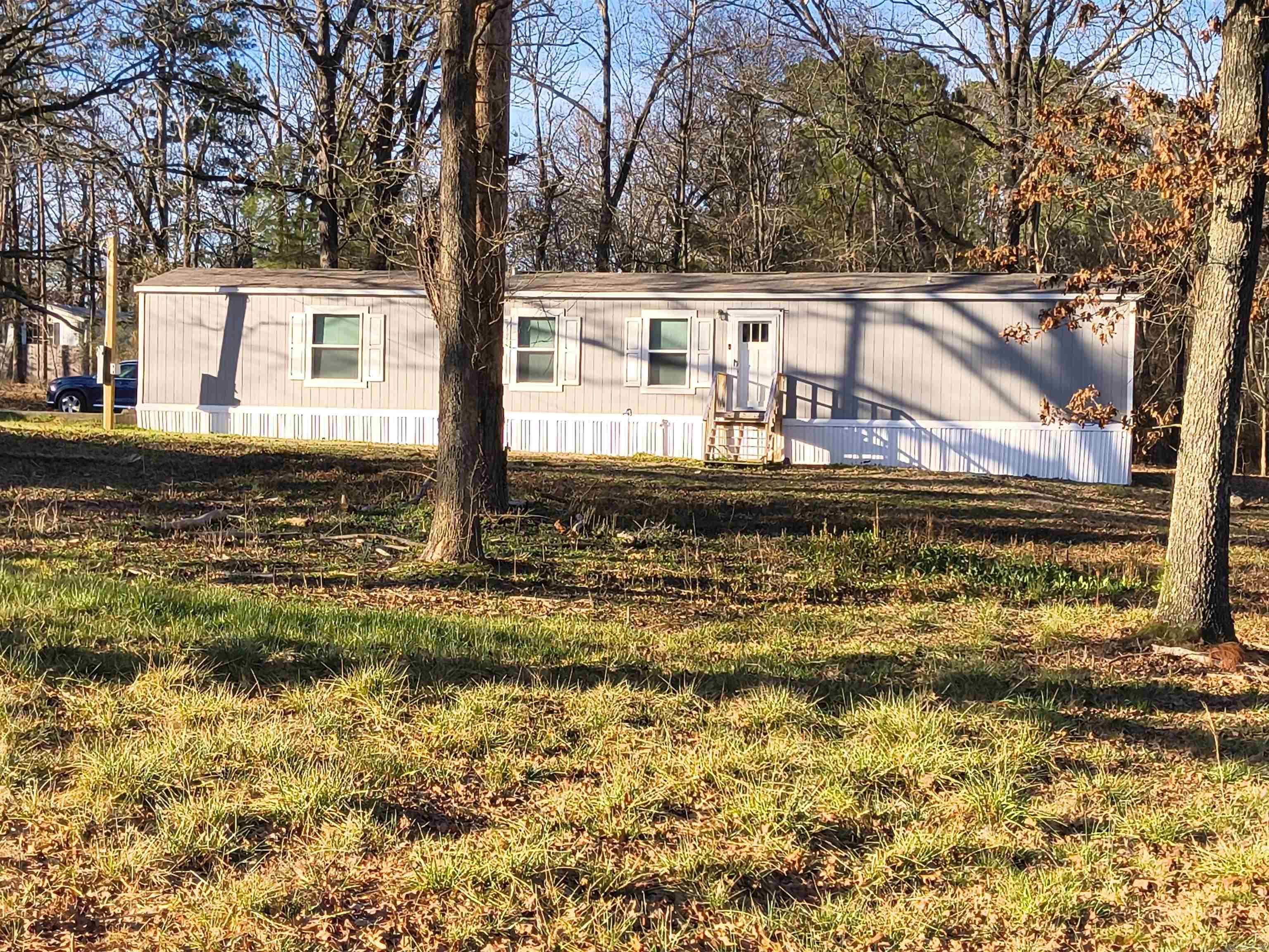 Like-New 2024 Mobile Home for Rent! Enjoy modern, comfortable living in this like-new 2024 model mobile home offering 1,280 square feet of thoughtfully designed space. This 3-bedroom, 2-bath home features an open floor plan, a spacious kitchen, and a separate laundry room for added convenience. Located in a quiet area of Little Rock, you'll enjoy peaceful surroundings while being just minutes from shopping, grocery stores, restaurants, and other everyday conveniences. If you're looking for a clean, modern rental in a great location, this home is a must-see!