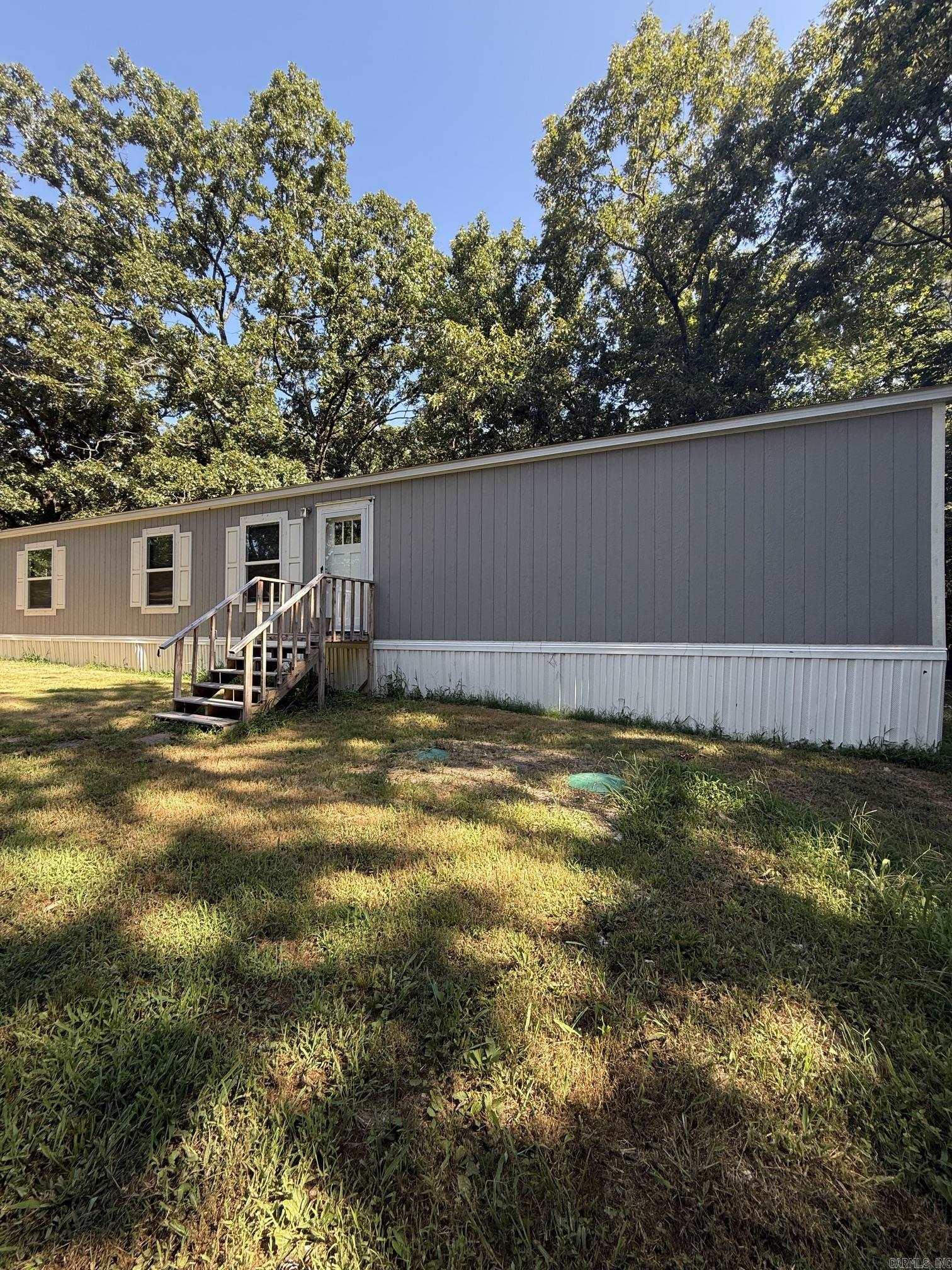 Like-New 2024 Mobile Home for Rent! Enjoy modern, comfortable living in this like-new 2024 model mobile home offering 1,280 square feet of thoughtfully designed space. This 3-bedroom, 2-bath home features an open floor plan, a spacious kitchen, and a separate laundry room for added convenience. Located in a quiet area of Little Rock, you'll enjoy peaceful surroundings while being just minutes from shopping, grocery stores, restaurants, and other everyday conveniences. If you're looking for a clean, modern rental in a great location, this home is a must-see!
