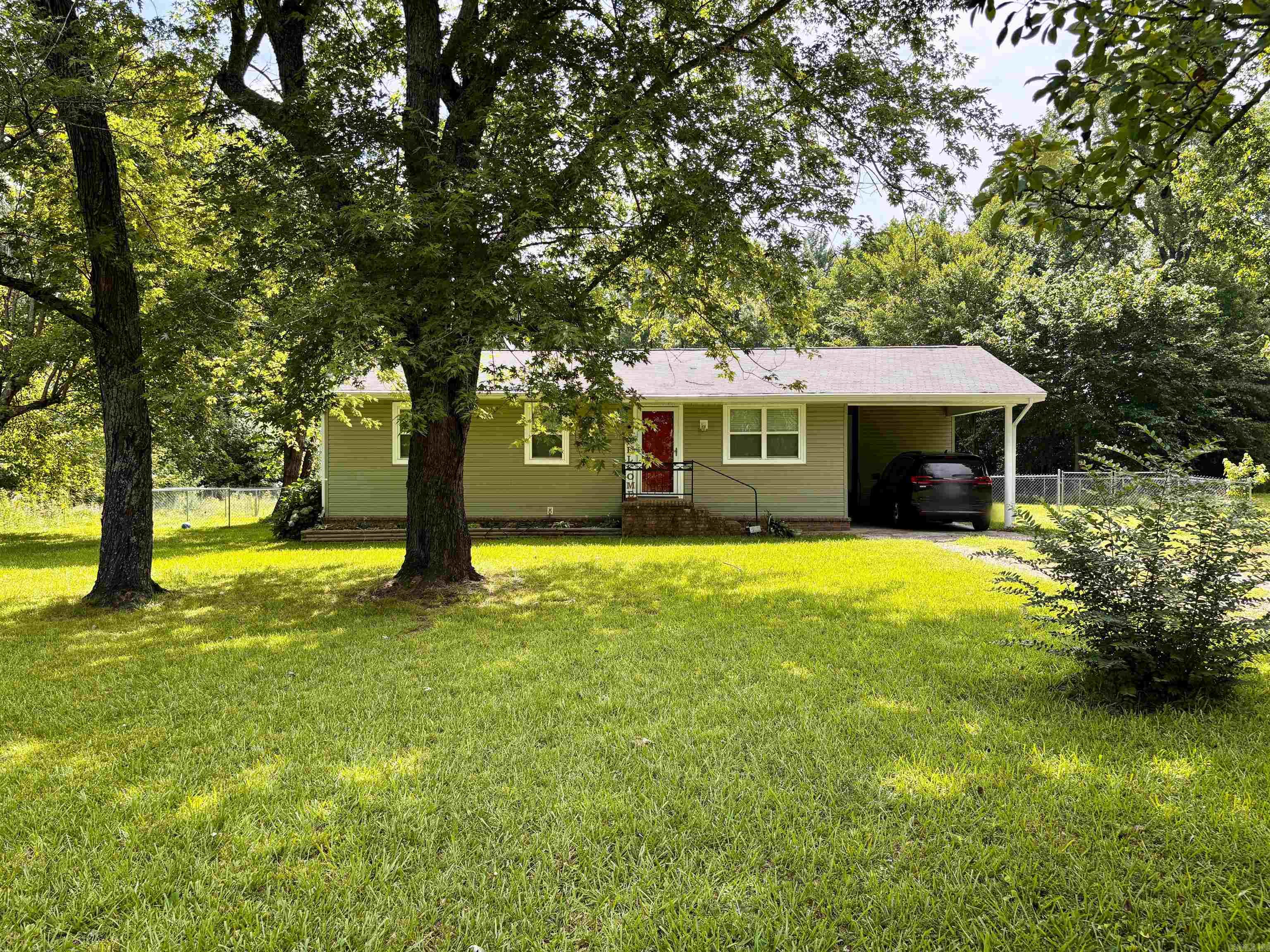 Cute 2/1.5 in the Vilonia area sitting on .76 of an acre! Home had a lot of updates in 2019 and new septic system in 2022. There's also a 28x32 metal shop.  Fenced backyard and nice covered wood deck!