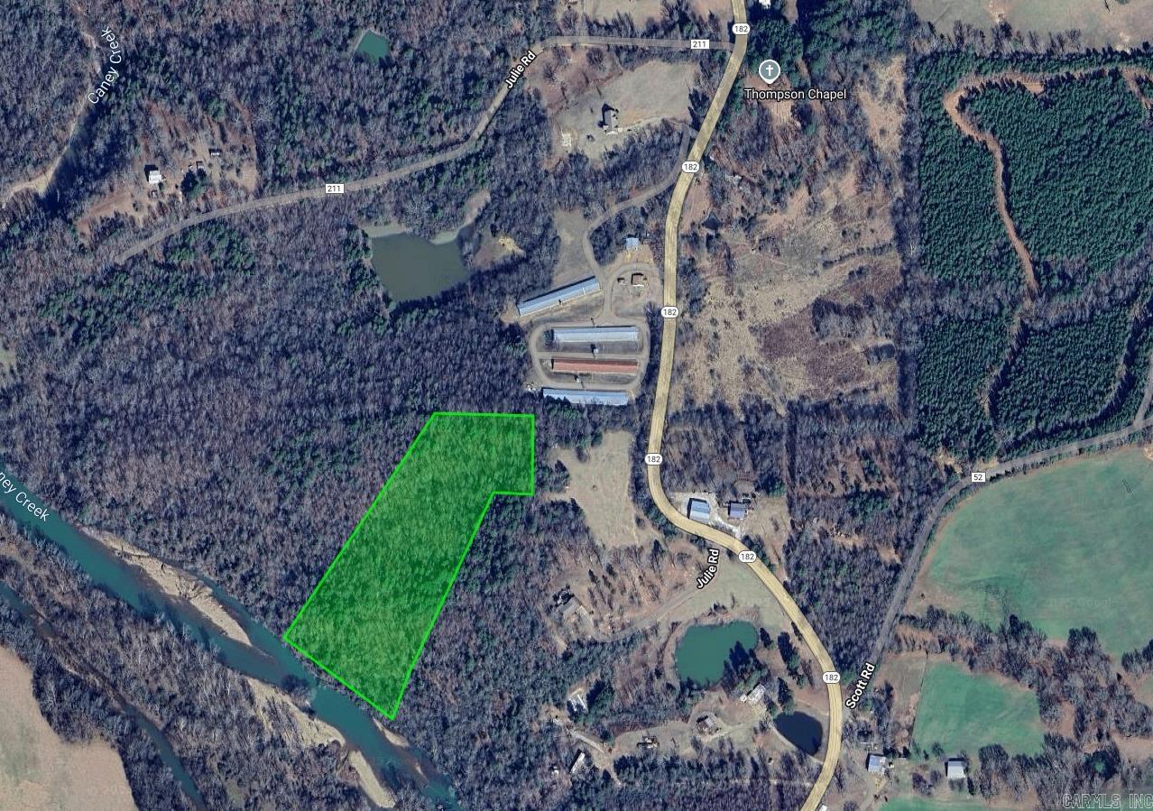 Hunting, fishing or build a new home on nearly 10 private acres with 550 feet of river frontage at Canney Creek (on the Caddo River).
