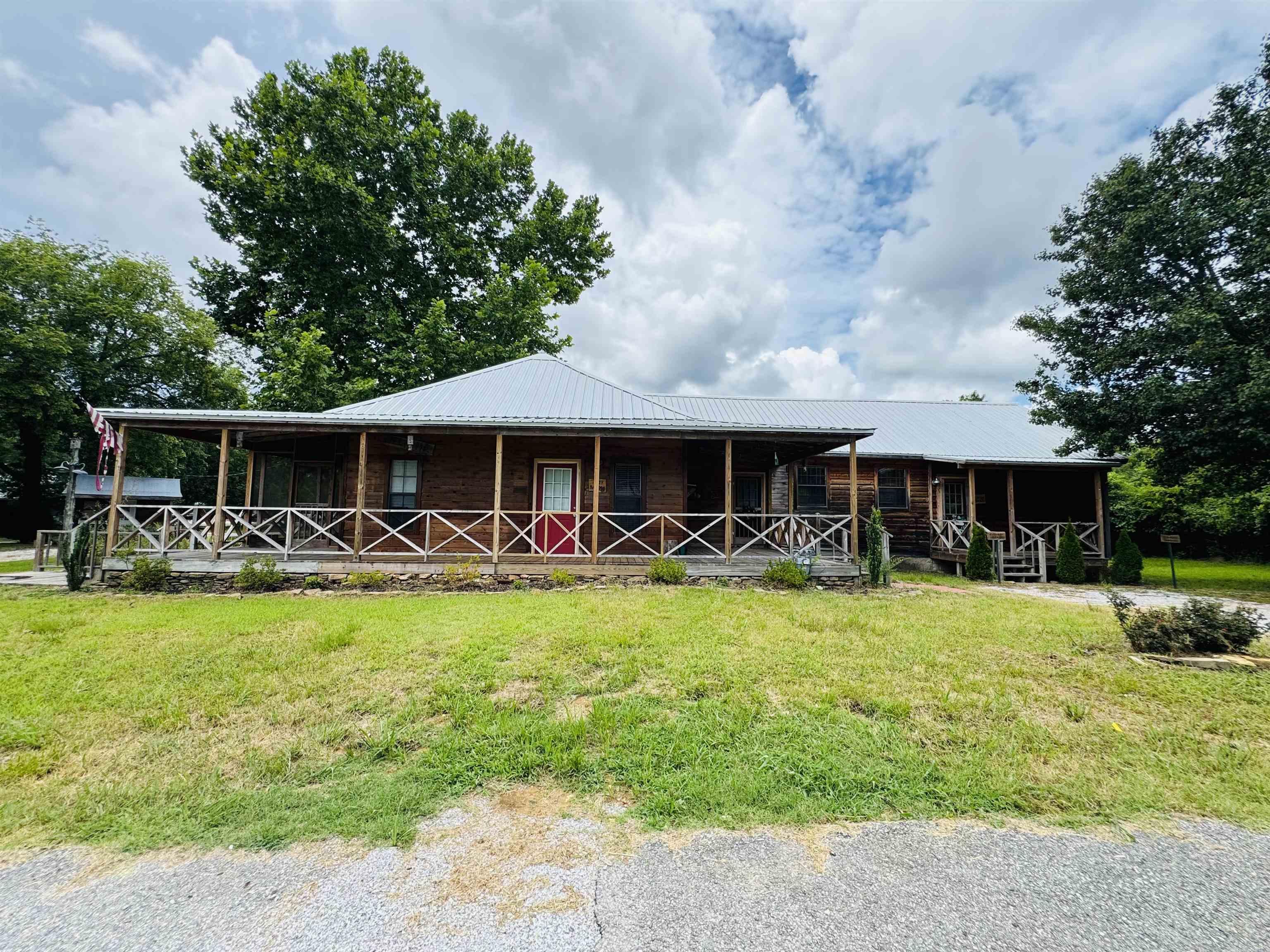 Investment opportunity in the heart of Mountain View! This 4 bedroom 4 bath was used as a nightly rental with exterior access to each room. This property offers potential for investors or buyers looking to own a vacation property in Arkansas's Folk Music Capital. Conveniently located near the historic downtown square, shopping, dining, and local attractions, this home is well positioned for short term rental income or personal use. Property is being sold as is, where is with no warranties expressed or implied.