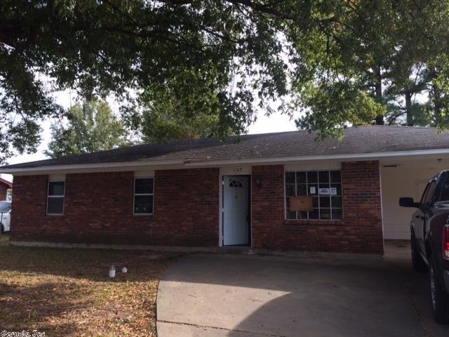 Three Bedroom, two bath home with large laundry, storage shed and carport  Go to homesearch.com to enter a bid