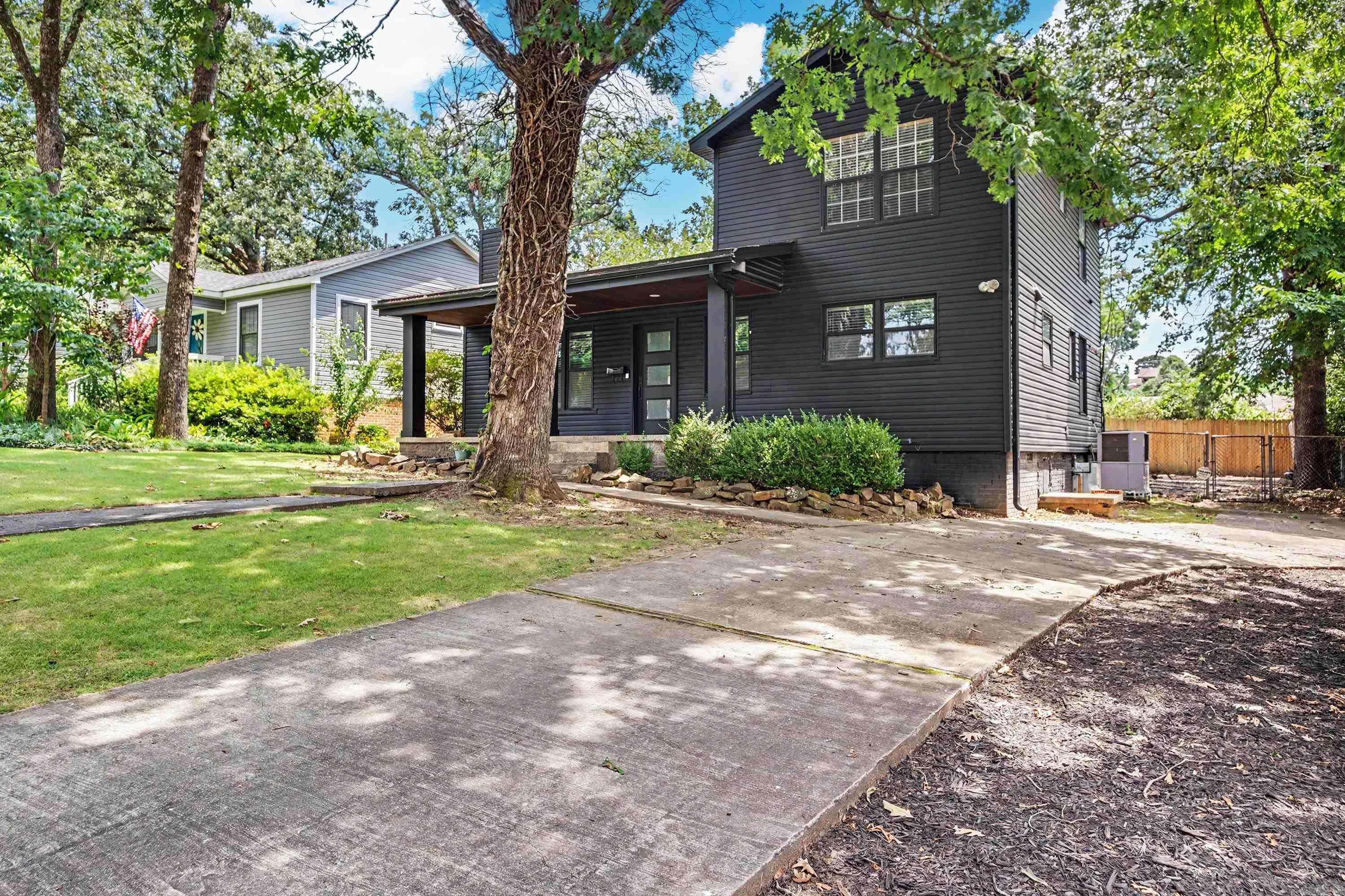 Move in ready and just steps from Hillcrest's best restaurants and shops. This updated home features a granite-and-marble waterfall island kitchen, updated HVAC and sewer line, fresh sod and landscaping, and a new covered patio behind an 8' privacy fence. Stylish, modern touches throughout, come see it for yourself!