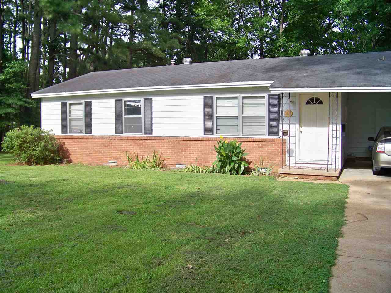 This 3BR 1BA house has great features that will make you want to call it home! Beautiful original hardwood floors. The living room has a large window for lots of natural light, current owners have made a great change that now opens up part of the living room to the kitchen so you are not cut out of the activity. New breakfast bar has been added & extra counter top & cabinets. Large laundry. New double doors w/hidden blinds go to your large deck where you can sit & enjoy your view of the pond & fenced yard.
