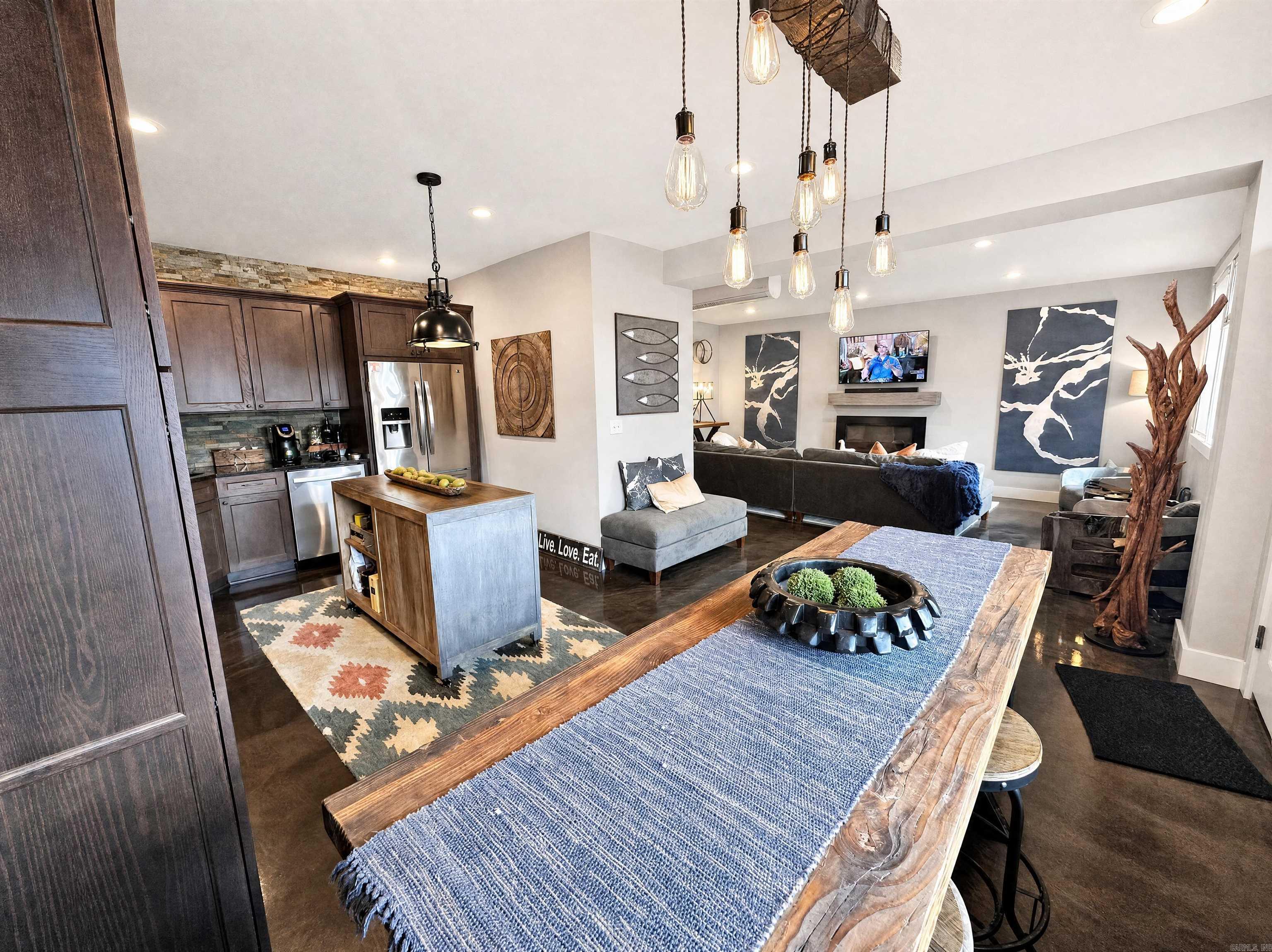 Suite 201 — Second-floor unit in the Narrows Inn, one of ten lakefront condos that have been completely renovated offered at auction. This 3 bed / 2 bath condominium (~1,437 SF) features a walk-through game or guest room and a level of custom finish work throughout, including Restoration Hardware fixtures, river stone sinks, river rock shower floors, custom paint and lighting, and barn doors. Kitchen and baths showcase Hickory and oak cabinetry with Restoration Hardware hardware, granite counters, and custom tile and stone accents. Offered through the Buyer’s Ultimate Choice auction with SOLDasap - you may bid on a single unit, any combination, or purchase all ten condos as a portfolio. Please visit our website or call our office for full terms and conditions soldasap.com and 870-236-6117.