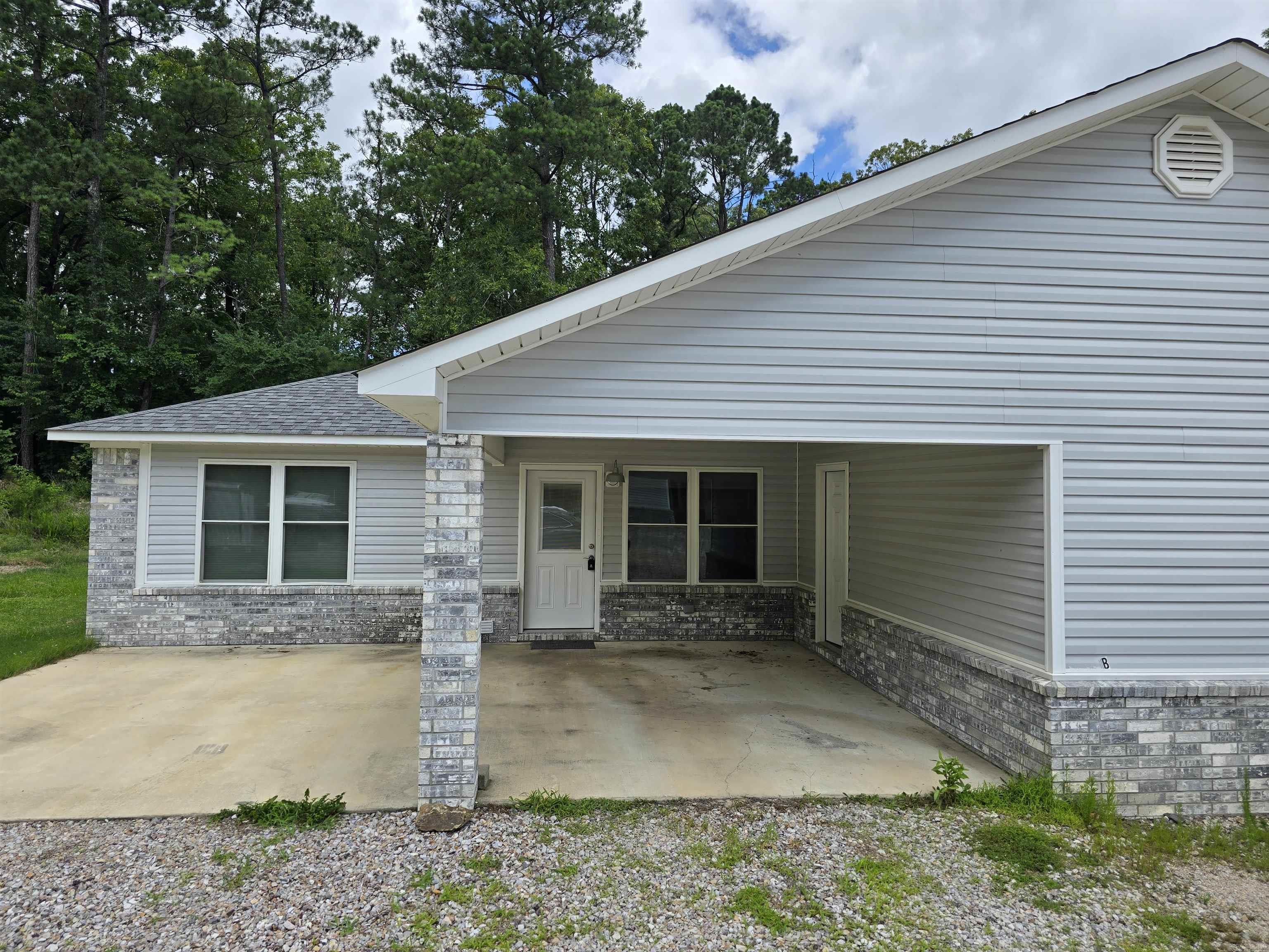 This 2-bedroom duplex offers a practical and comfortable layout featuring large bedroom closets and an outdoor storage closet for extra gear. The kitchen comes fully equipped with a refrigerator, an electric range/stove, and an above-the-range microwave and vent hood. For added convenience, the home includes washer and dryer hookups and a covered carport for protected parking. This property is located within the desirable Lake Hamilton School District, placing you just minutes away from local schools and outdoor recreation on Lake Hamilton. It also offers a straightforward commute to both the excitement of 15 minutes to Oaklawn Racing Casino Resort and 20 minute drive to the historic dining and shopping of downtown Hot Springs.  Rent: $1,500 per month   Bed/Bath: 2 Bedrooms / Duplex layout   Appliances: Refrigerator, electric range/stove, and above-the-range microwave/vent included Laundry: Washer/dryer hookups available Parking & Storage: Covered carport and an outside storage closet Pet Policy: Small cats and dogs allowed (requires a pet deposit and monthly pet rent) Unit B available now Unit A coming in August