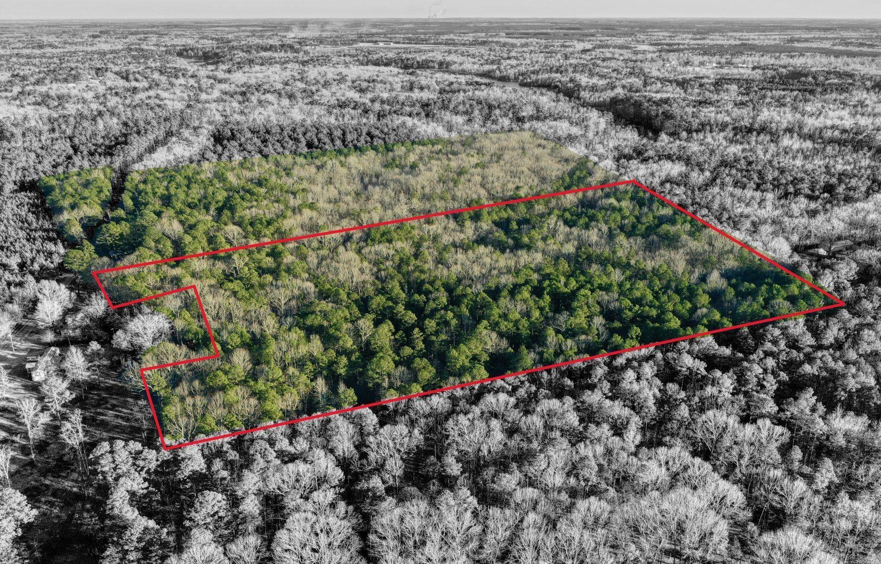 This is the Tract 1 with 16.71 acres divided from this parcel 001-02307-000 Saline County. The other Tract 2, 3 also available for purchase at $15k per acre. Refer to the survey for details of the split.  This 16.71 acres has 108.7 feet paved road front on Hicks Rd, water and electricity is on the street. The land has matured timber, has agriculture exemption for low property tax. Build your own farm on this wooded land while still enjoy the vicinity to the city, Benton or Little Rock both are only 20 mins away. Top schools East end elementary and Sheridan middle/ high school.
