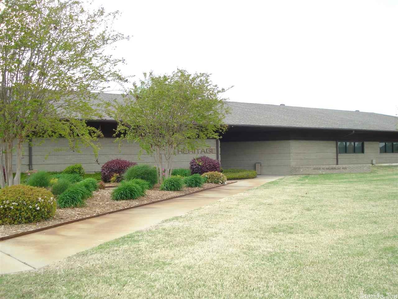 NEWLY RENOVATED INTERIOR!!  • Large common break room. two sets of men's and women's bathrooms. • Rear and side parking with over 100 dedicated spaces. • location is on a corner lot for easy access. • Close to the interstate and in the heart of Conway. • Easy access to major food chains. • 12 offices (6 each side) • One common area break room. • 4 bathrooms ( 2 men's and 2 Women's)