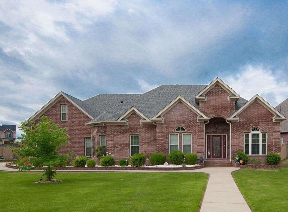 Has 3 bedrooms down and 1 bedroom up, 2.1 bath, bonus room, 3 side parking garage and in-ground Storm Cellar in Garage. Updates in 2015 - Roof, Gutters, Screened Porch and Carpet
