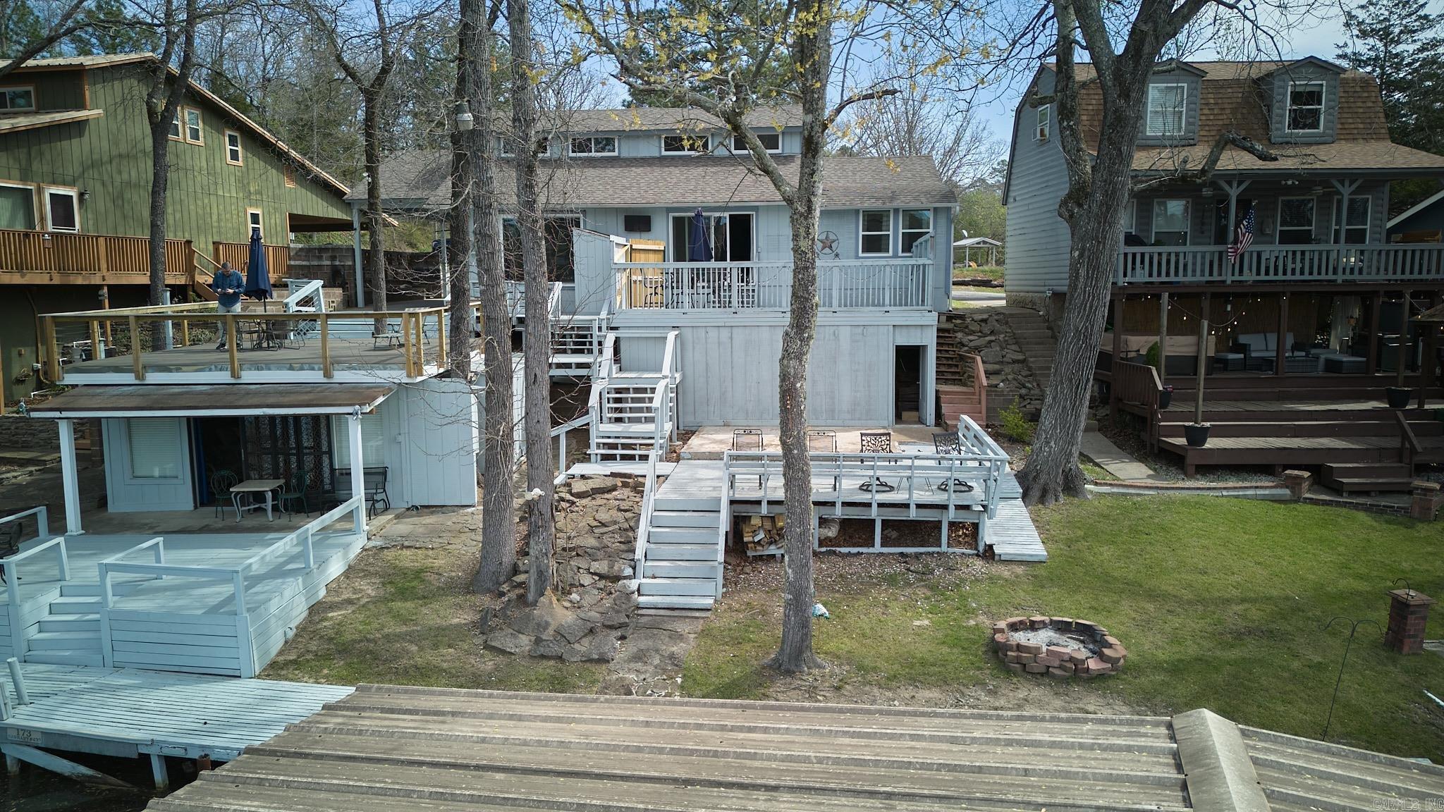 INVESTMENT PROPERTY? 3 RENTABLE UNITS!  on Lake Hamilton! Welcome to 173 Barbary Unit #433 & #434 in beautiful Hot Springs—where lake life and income potential come together! These units offer a rare opportunity to own on Lake Hamilton with direct water access and #434 has boat dock, making it perfect for both personal enjoyment and short-term rental income. Wake up to stunning lake views, spend your days on the water, and unwind in a setting designed for relaxation. Whether you're looking for a weekend getaway, full-time lake retreat, or a turnkey VRBO/Airbnb investment, this property checks all the boxes. These have been upgraded and remodel and are ready if you want to live on the lake and have rental income or make them a great investment! Also make sure you check out the Studio down below #434. Agents See Remarks!!!