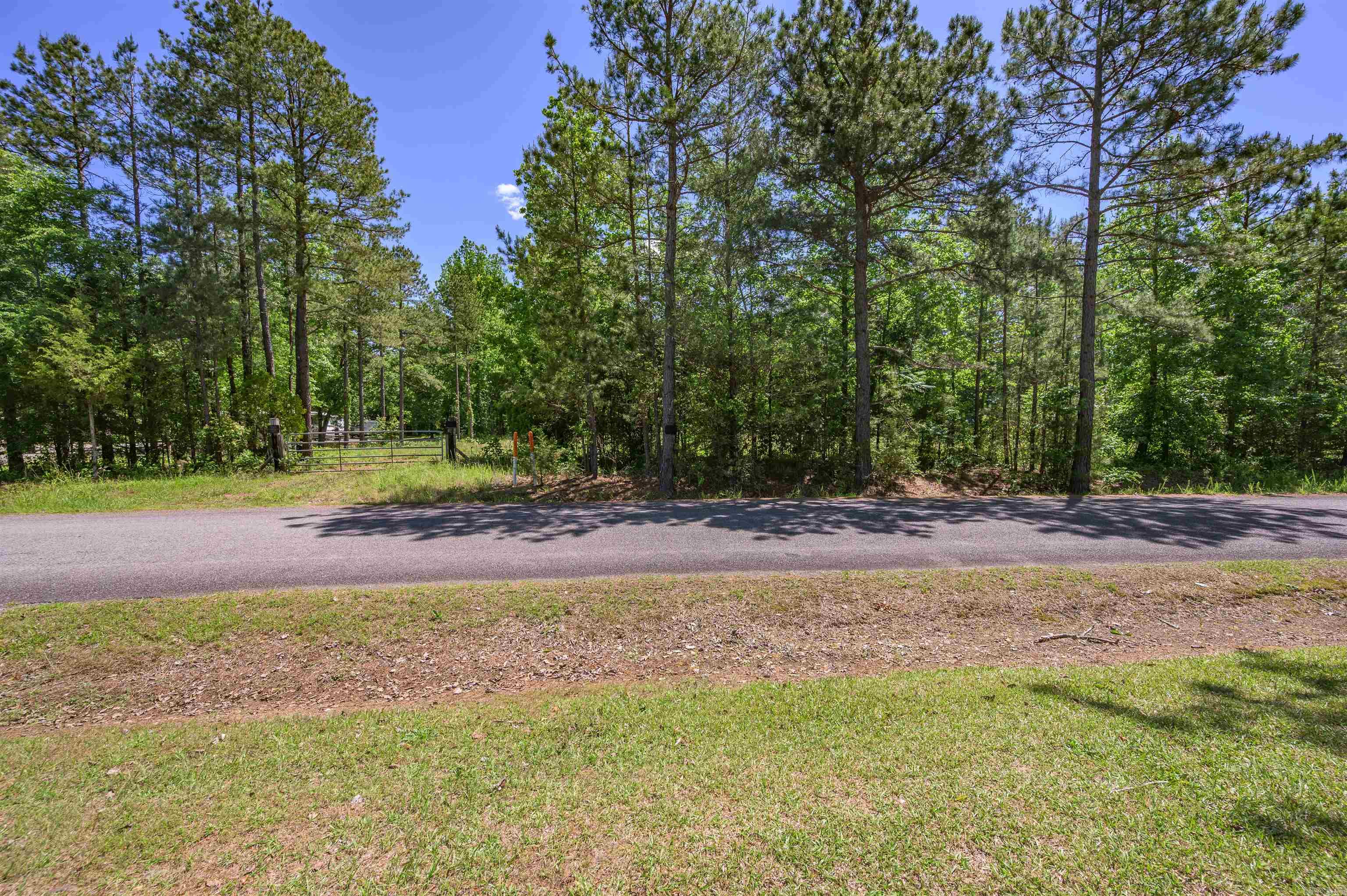 Here is your chance to own a great piece of property! Less than 2 minutes from Sugarloaf, at Greers Ferry Lake, this property offers potential for rental or building that amazing weekend get-a-way! Want to build storage for RV's or boats? Maybe build an RV park for extra income? With no restrictions on the property, the possibilities are endless! Electric is already on the property, and water is at the gate, just waiting on the new owners to have a meter installed.