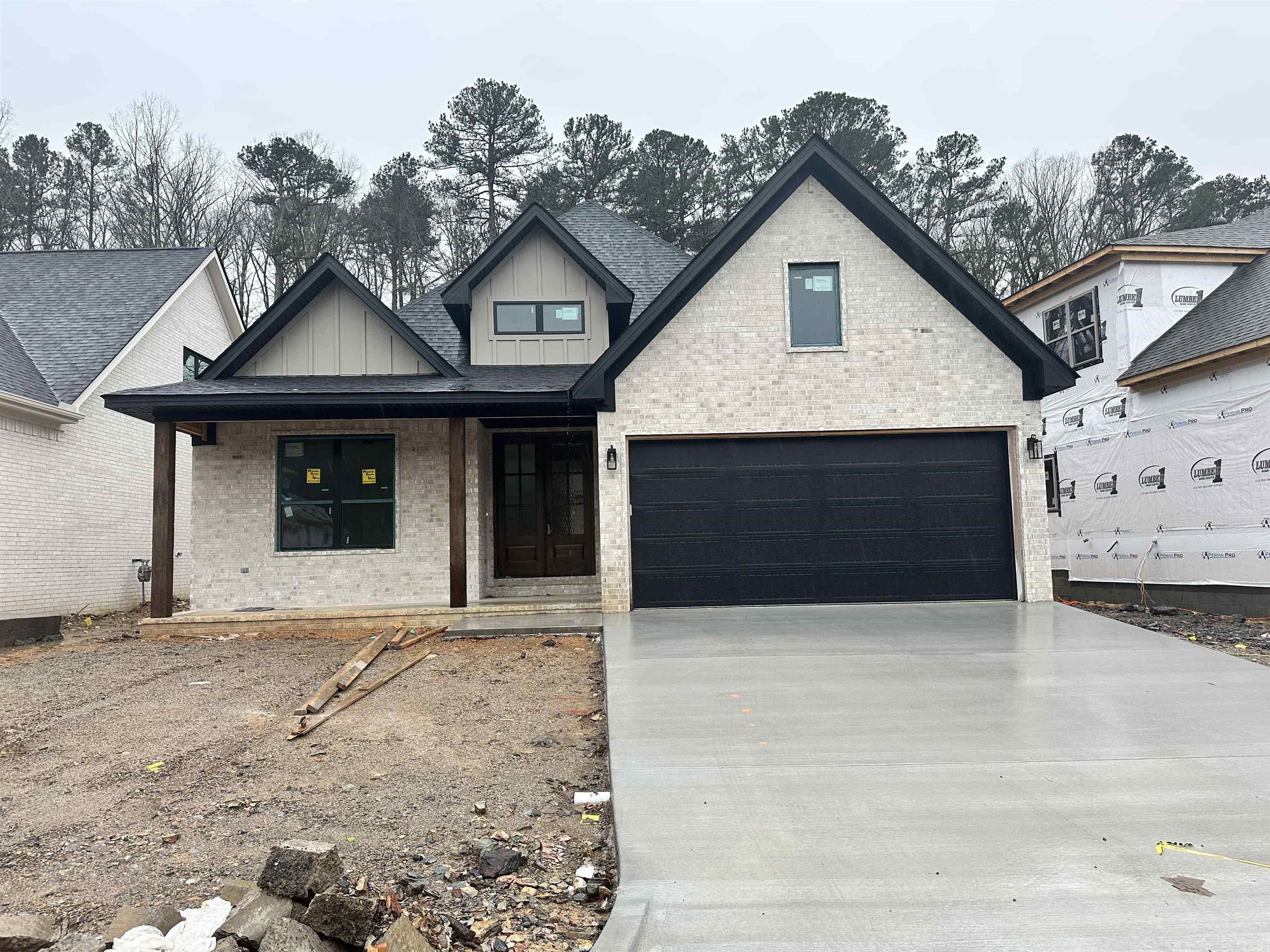 This Stunning 3 bedroom 2 bath home, located in Kinley Ridge, one of Chenal's Newest Subdivisions, is a Must See! This Open Floor Plan includes a gourmet kitchen with an oversized island, quartz countertops, gas range, microwave drawer, and dishwasher and offers all the lighting you'll need with pendants over the island and plenty of recess cans. Kitchen is open to the dining area and great room while enjoying the beautiful vaulted ceiling, stained beam, and fix glass windows. Enjoy a spacious master bedroom with trey ceiling, a custom tile shower and large walk-in closet with built-ins in the master bath. Other features include, Luxury Vinyl Plank throughout with tile floors in both baths, covered front and rear porches with custom wood ceilings, and a 2 car garage. Kinley Ridge is convenient to shopping and Fine Dining in WLR. Schedule your appointment today!