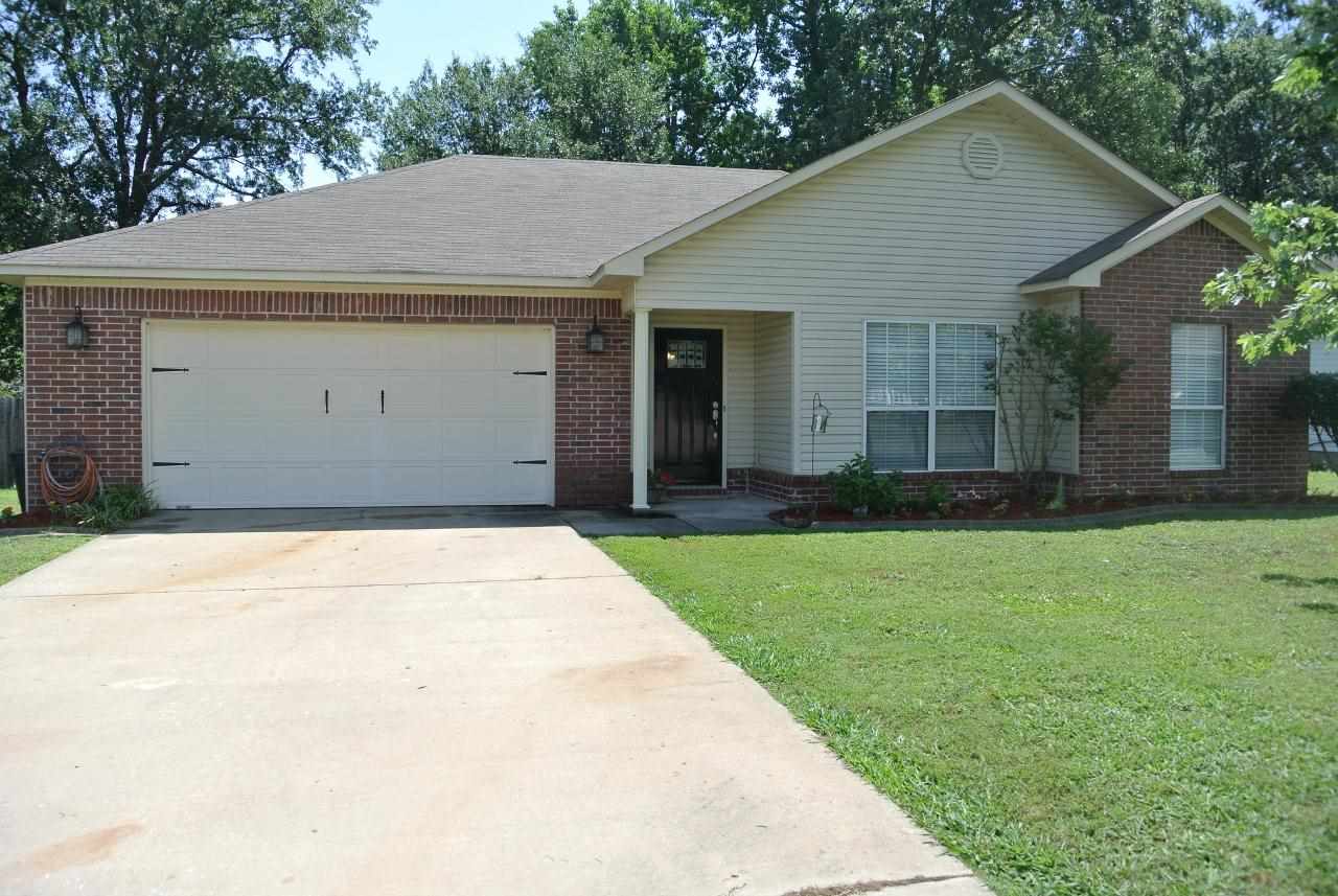 Get ready to fall in love! Hardwoods in LR and hall, new fashionable front door, granite tile counter tops, slate back splash, new light fixtures and fresh paint throughout. The back yard is ideal for outdoor lifestyles featuring a deck for entertaining, custom stone outdoor fireplace, and a hammock deck beneath its own natural canopy of shade trees. A perfect sanctuary from the busy word. It won't change your life, just your lifestyle. Seller will pay customary closing costs with acceptable offer.