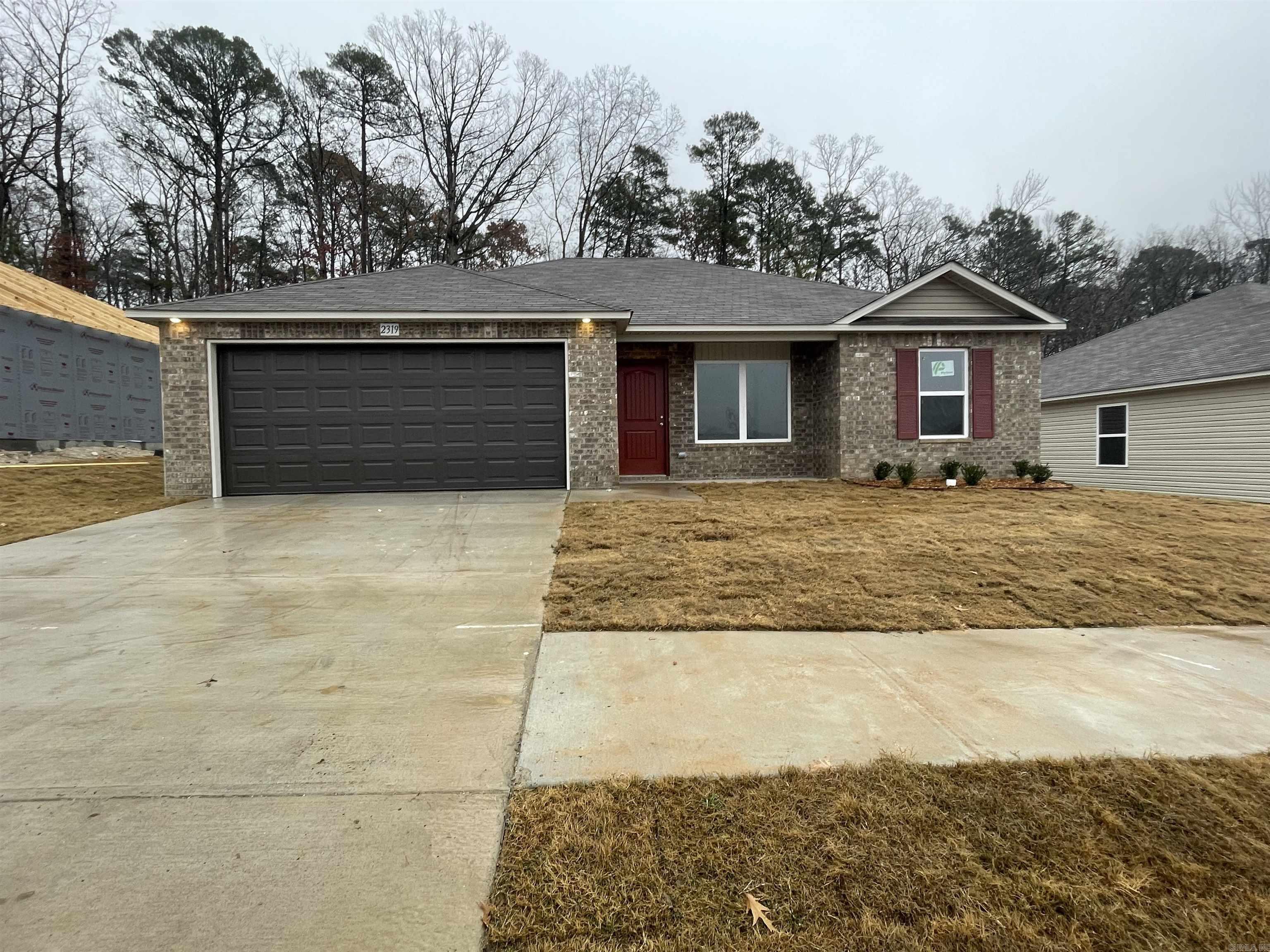 The time-tested Coleman plan. This home makes smart use of every square foot of space! The split floor plan is open from the Living Room to the eat-in Kitchen. Come see it today!  Clever upgrades in this home: 14x10 uncovered back patio, soaker tub/shower combo in Master Bath, plumbing faucet upgrade 2, 8" deep Kitchen sink, 16" laminate bar top in Kitchen, Luxury Vinyl Plank flooring in wet areas and Living Room and adjacent hallways, raised ceilings in Living Areas, Cheyenne style interior doors, baseboard upgrade level 2, full sod, microwave hood in Kitchen, smooth top self-cleaning range.    Hilldale Crossing is convenient to HWY 5, the HWY 30/430 interchange, and Outlets of Little Rock.