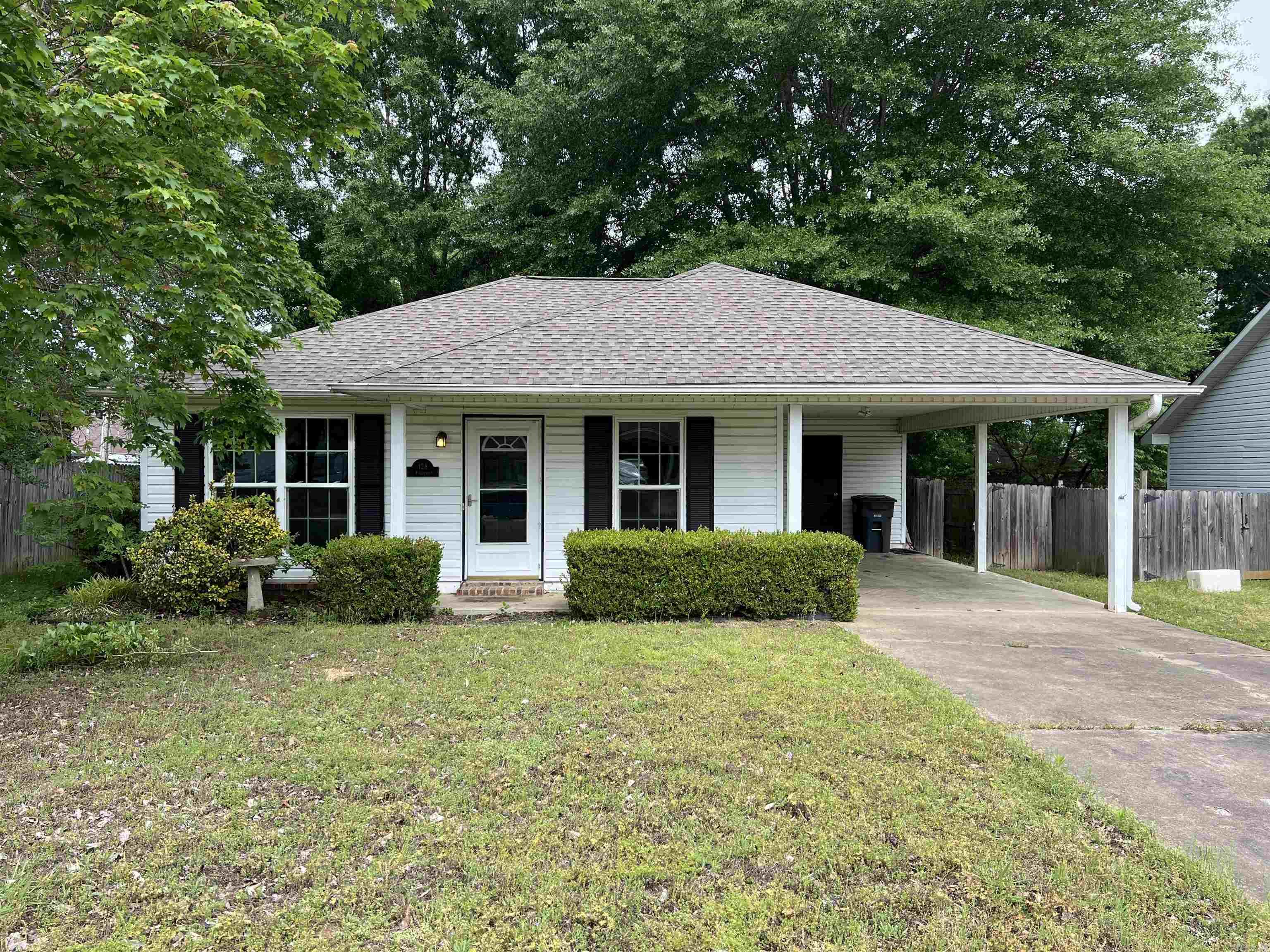 Opportunity knocks at 128 Field Crest in Searcy, AR! This Northfield Subdivision 3-bedroom, 2-bath home with a 1-car carport built in 1992 may be perfect for investors or buyers ready to create their dream space. Situated on a solid slab foundation, the home offers great bones, newer Pella windows throughout, and a roof replaced in 2018—providing a strong starting point for renovation. The seller began updates but is unable to complete them, leaving a blank canvas for the next owner. Interior flooring has already been removed, and both bathrooms have been taken down to a shell, ready for your custom finishes and fixtures. The home will require a new HVAC system (quote for $11,224.84 from Noland Heat & Air for complete system and install) and a new water heater. Home is being sold AS IS. Outside, you’ll find a fully fenced backyard, ideal for pets, entertaining, or future landscaping enhancements. With Zillow estimating a home valuation of $154,500 in normal condition, this property is attractively priced at just $113,000—leaving plenty of room for improvements.