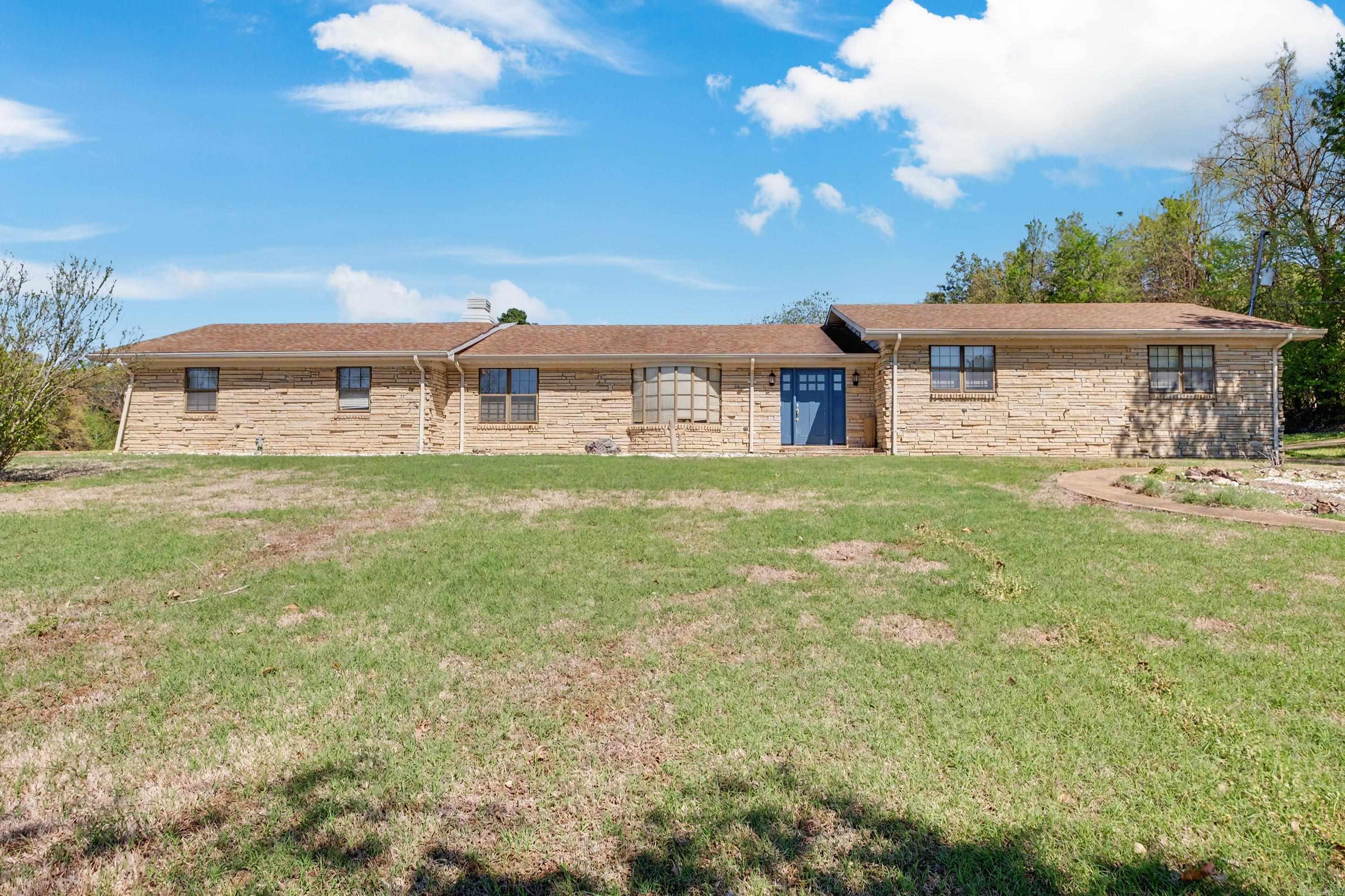 If you've been looking for a home in a country setting yet close to everything, look no further. This uniquely built traditional ranch-style home features a distinctive stone masonry facade as well as an architectural shingle roof. It is situated on a generous 4.27-acre lot, providing significant outdoor space for the children and pets to roam and play. The long driveway is perfect for parking during family gatherings.  Inside this 1,652 square feet home are 3 bedrooms, 1.5 baths, huge family room, nice-sized kitchen with dining area, and a finished basement that could be used for a hobby room or whatever you'd like. The bedrooms are very spacious. This home just needs a little tlc to bring her to life again. This is the perfect spot to live in. Don't miss out. Call today for your personal tour!