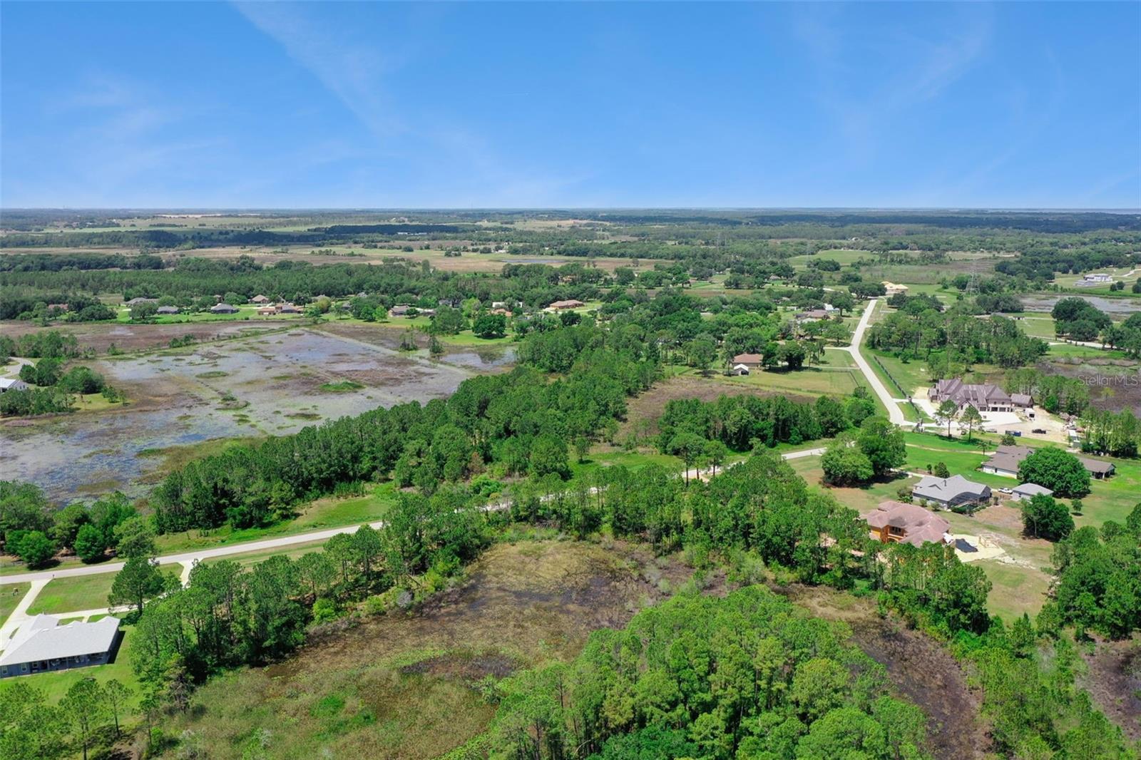Buyers financing fell through.   Their loss your gain If you’ve been dreaming of a quiet retreat with room to breathe, this 6.5-acre homesite in Arrowtree Reserve may be exactly what you’ve been waiting for. Tucked among beautiful custom homes on large lots, this property offers the perfect balance of privacy, nature, and convenience.   Imagine waking up to peaceful views, tending to your horses or small farm animals, and enjoying the serenity of your own wooded sanctuary. With a mix of open land and shaded trees, plus a raised homesite and driveway path already in place, the groundwork is set for your dream home.  You’ll feel worlds away, yet you’re only minutes from Clermont’s vibrant downtown, great restaurants, local shops, and community events. Quick access to major highways and the Turnpike makes every commute or weekend adventure effortless.

Land like this doesn’t come around often—especially in such a sought-after community. This is your chance to create the lifestyle you’ve always imagined.
