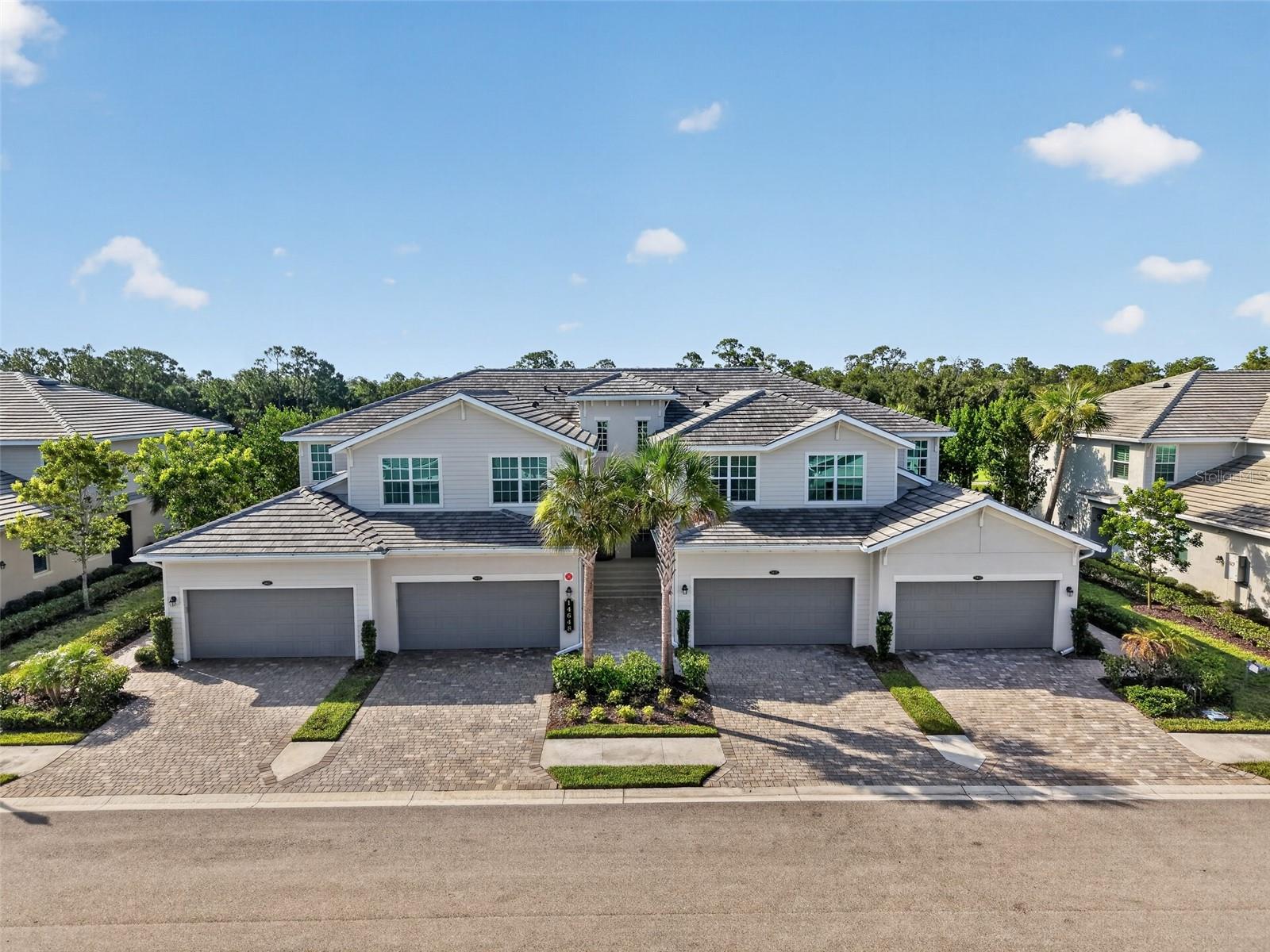 Experience RESORT-STYLE living, with GOLF MEMBERSHIP INCLUDED, in this beautifully appointed TURNKEY UPPER-LEVEL COACH home in the highly sought-after HERITAGE LANDING GOLF & COUNTRY CLUB! Offering one of the community’s most desirable floor plans, this spacious 3-bedroom, 2-bath residence features an open and inviting living space, 9-foot ceilings, an attached oversized garage with room for two cars plus a golf cart, (one of the two garage photos was virtually staged removing all items to show space), and BEAUTIFUL VIEWS OVERLOOKING THE GOLF COURSE.



Designed for both comfortable everyday living and entertaining, the open-concept floor plan is filled with natural light and flows seamlessly to the private screened lanai—the perfect place to enjoy your morning coffee, unwind at the end of the day, and take in the peaceful golf course views. The spacious kitchen is the heart of the home and features an oversized island, granite countertops, abundant cabinetry and storage, and a separate pantry closet. The generous primary suite offers a relaxing retreat with TWO large walk-in closets and an en-suite bath featuring separate vanities and large walk in shower. Two additional bedrooms provide plenty of space for guests, a home office, or hobbies.



Perfectly situated just a short distance from the clubhouse and resort amenities, this home offers an exceptional combination of convenience, space, and scenery. Your bundled GOLF & SOCIAL MEMBERSHIP is included, providing access to an impressive array of resort-style amenities. Play the championship Gordon Lewis-designed golf course, unwind at the resort-style main pool with lap lanes, enjoy four satellite pools throughout the community, or stay active with pickleball, tennis, bocce, entertainment, clubs and scheduled activities.



The impressive fitness center offers state-of-the-art equipment and group fitness classes, while the spa provides the perfect place to relax and recharge. End your day with friends at the poolside tiki bar and restaurant or enjoy dining, entertainment, and social events at the clubhouse. This TURNKEY coach home offers the opportunity to start enjoying the Heritage Landing lifestyle from day one!