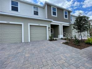 Welcome to this Like-New 3 Bedroom, 2 & 1/2-Bathroom Townhome in one of the most growing areas in Kissimmee. This pristine home offers a contemporary living, convenience, and modern comfort. The open floor plan creates an inviting atmosphere, perfect for entertaining family and friends. The light filled living area blends with the dining area and sleek kitchen. The kitchen features stainless steel appliances, quartz countertops and ample cabinet space. Upstairs, you'll discover a spacious primary bedroom complete with a walk-in closet and ensuite bathroom for privacy. Two additional well-appointed bedrooms share a full bathroom to ensure ample space for everyone in the household. The laundry closet is conveniently located upstairs adding an extra layer of practicality to your daily routine. It features a one-car garage with additional 4 Parking Spaces in the driveway. A downstairs half bath is located downstairs for added convenience. Enjoy multiple storage areas including under stair storage and a large walk-in kitchen pantry. Step out to the paved lanai, which is perfect for a cookout on weekends. The neighborhood features a pool with cabana, park and pocket parks, butterfly garden, and sports court. Rent includes Exterior Building and Landscape maintenance, lot Irrigation, Fertilization, Pest Control, Trash Pick Up and Common Area Maintenance. The community is conveniently located to retail, employment centers, entertainment, healthcare, and more via Highway 192 and Florida's Turnpike. Just minutes to multiple schools and colleges, Hospitals, Neo-City, Osceola Heritage Park and access to major highways. Don't miss this opportunity to make this townhouse your home! Schedule your private showing today and get ready to fall in love! This home is tenant occupied. Available July 6th. Taking applications now!