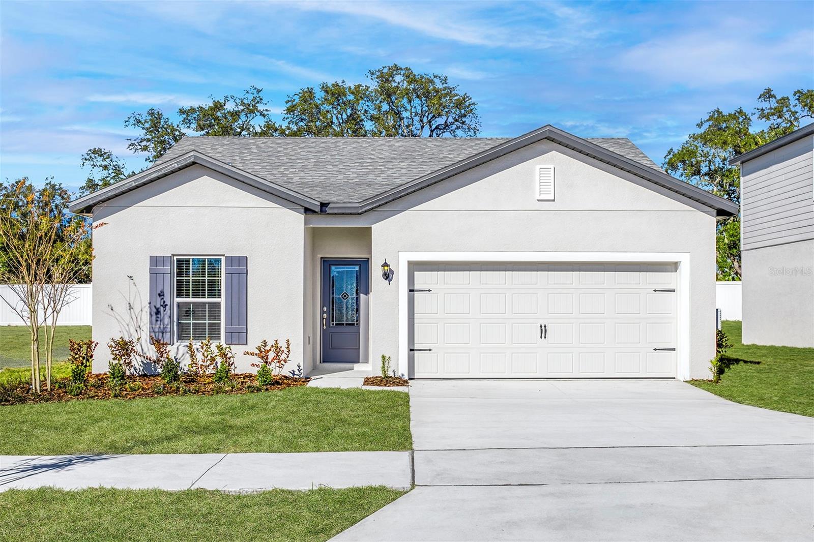 Pre-Construction. To be built. Welcome to the beautifully designed Tula model in the desirable Tula Parc community of Astatula, FL. This spacious 3-bedroom, 2-bathroom home offers a perfect blend of modern finishes and functional living, ideal for both relaxing and entertaining.

The home features a bright, open-concept layout where the kitchen, dining area, and family room come together seamlessly to create a welcoming and versatile living space. The kitchen is equipped with granite countertops, 36” upper wood cabinets with crown molding, energy-efficient Whirlpool® appliances, USB-compatible outlets, and sleek LED flush-mount lighting, making it both stylish and practical.

Throughout the home, you’ll find luxury vinyl plank flooring, adding durability and a contemporary touch. A separate laundry room provides added convenience, while the professionally landscaped front yard enhances the home’s curb appeal.

The private master suite, located at the rear of the home, offers peaceful views of the backyard, along with a spacious walk-in closet and a well-appointed bathroom featuring a large vanity with ample storage and a step-in shower. Two additional bedrooms provide flexibility for family, guests, or a home office.

Living in Tula Parc means enjoying community features such as a gazebo and playground, as well as close proximity to Little Lake Harris and the Chain of Lakes, perfect for boating, fishing, and kayaking. With nearby parks and easy access to Orlando’s shopping, dining, and entertainment, this home offers the ideal combination of comfort and location.

The Tula model is a wonderful opportunity to enjoy modern living in a peaceful and convenient setting—schedule your tour today!