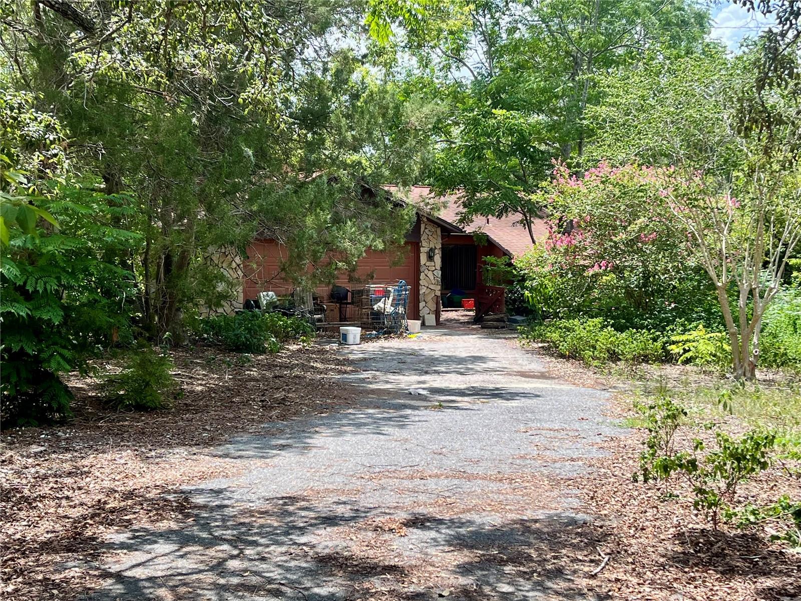 2 bed, 2 bath, 2 car garage home on 2.2 acres with a 2 stall barn and additional out buildings. Home has a nice layout and a large enclosed room on the back of the home with a door that leads out back.  The grounds need serious TLC to bring them back to their former glory!  Then you'd have a spectacular property and can bring in your farm animals, pets, tractors and toys.  Quiet area with close proximity to shopping, restaurants, golfing venues, medical facilities, etc. Property is being sold "As-Is" and buyer will be responsible for remainder of clean out.  Buyer will need to allow seller up to 60 days to close.  All information believed to be accurate but buyer/buyer's agent should confirm.
