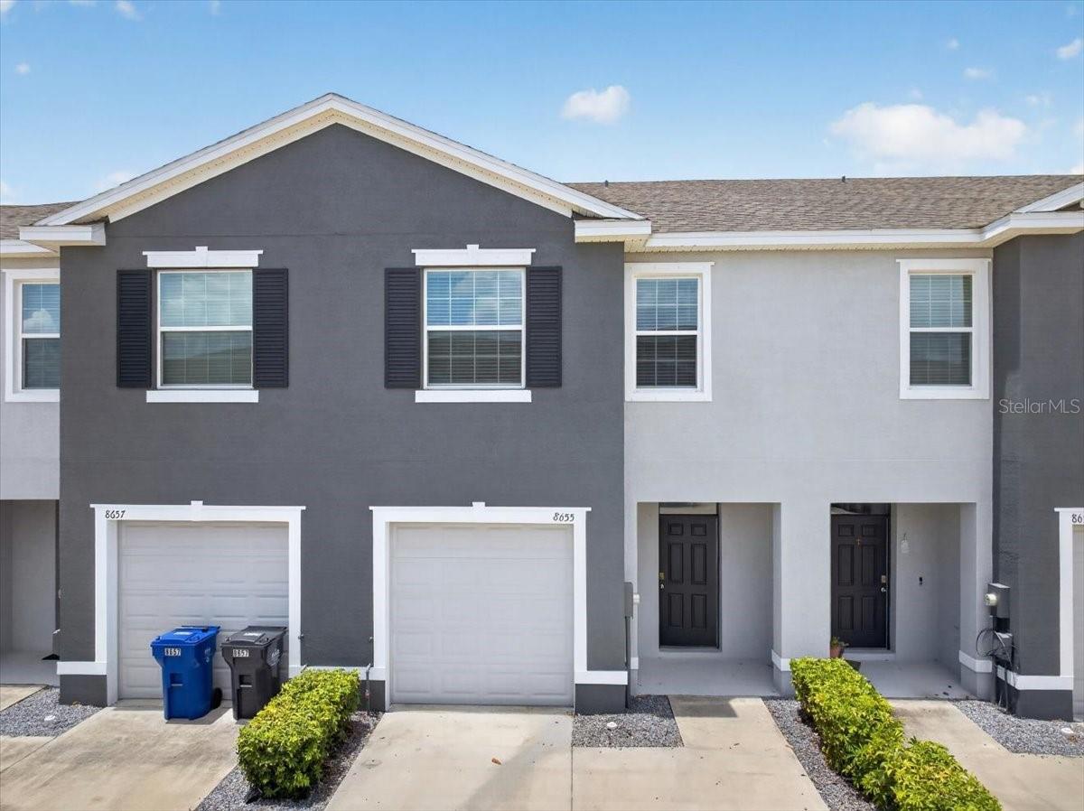 Welcome to this move-in ready 3-bedroom, 2.5-bathroom townhome located in the desirable gated community of Osprey Lakes West. From the moment you step inside, you'll appreciate the bright, open-concept layout with sight lines that extend through the sliding glass doors to the screened lanai and peaceful conservation area beyond. With no rear neighbors, you'll enjoy privacy and serene views right from your living room. Designed with entertaining in mind, the spacious living, dining, and kitchen areas flow seamlessly together, while a convenient half bath is located downstairs for guests. Upstairs, you'll find all three bedrooms, including a spacious owner's suite featuring two walk-in closets and a private en-suite bathroom with dual vanities. Two additional generously sized bedrooms and a full bathroom complete the second floor. Additional highlights include a rare double driveway with parking for up to four vehicles, a low HOA, gated community living, and move-in ready convenience. Whether you're a first-time homebuyer, downsizing, or looking for a fantastic investment opportunity, this townhome checks all the boxes. Perfectly situated just minutes from the Selmon Expressway, this home offers an easy commute to Downtown Tampa, MacDill Air Force Base, and everything the Tampa Bay area has to offer. You'll also enjoy being close to Target, Publix, Home Depot, Xscape Theatres, restaurants, shopping, and more.