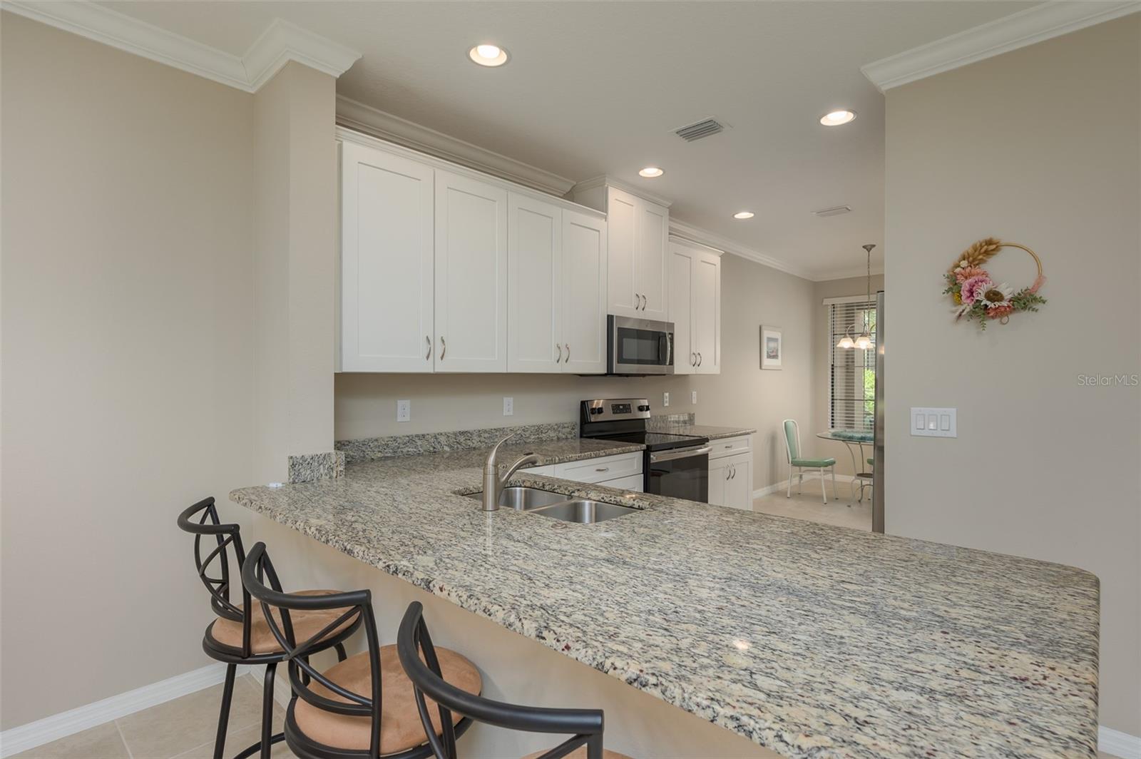 GARDEN HOMES AT ESPLANADE ON PALMER RANCH - Residential