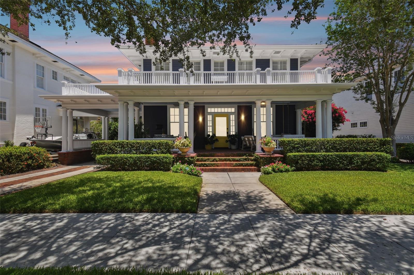 This stunning Historic Hyde Park home has been meticulously renovated and updated with the highest quality finishes, ready to welcome its next owner. Experience all the charm of Hyde Park without any of the headaches!
Step onto the expansive front porch and enter to see the refinished, gleaming heart-of-pine flooring that flows throughout the home. The large front room, currently used for dining and living, boasts a cozy fireplace and abundant natural light. The gourmet eat-in kitchen features Subzero/Blue Star appliances, marble countertops, custom inset cabinetry, fridge drawers, two dishwashers, and a spacious pantry/laundry area, making it a chef's dream. There is also a large family room with fireplace and a ½ bath on the main floor.
The enormous primary suite offers two custom walk-in closets and a lavish marble bathroom with custom cabinetry, Waterworks faucets, and a separate garden tub and shower. Two additional large bedrooms on the second floor each feature walk-in closets and share a beautiful marble hall bath with Waterworks fixtures, separate shower, and garden tub.
Enjoy the luxurious screened-in porch overlooking the expansive lawn and heated pool, perfect for hosting gatherings. The two-story guest suite includes a downstairs bonus room with a half bath and an upstairs bedroom suite that rivals the primary suite, featuring a large storage closet and a spa-like bathroom.
Recent updates include new AC units, a new roof, updated plumbing, renovated bathrooms, floor refinishing, new landscaping, new paint inside and outside, and much more.
This home seamlessly blends historic charm with modern luxury, offering a unique opportunity to live in one of Hyde Park's most coveted residences. Don't miss out on this rare and beautiful gem!