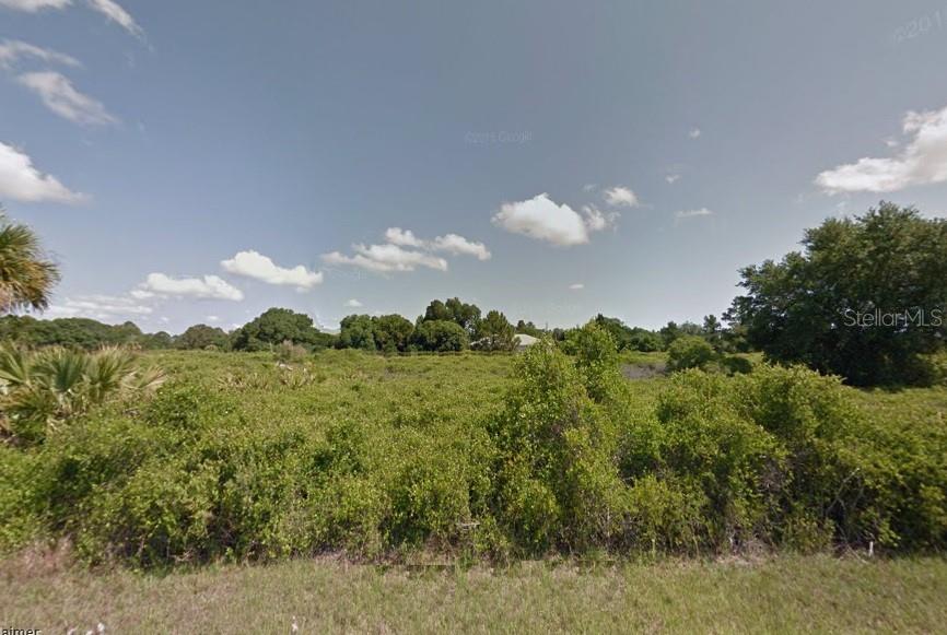 This desirable double-lot parcel is situated in a developing residential area and provides ample room for a larger custom estate, a circular driveway, and/or extensive outdoor living areas like a pool and lanai while still maintaining ample green space.  The northern boundary of these lots abuts a protected 60-foot greenbelt, a permanent buffer and a scenic natural view that ensures permanent rear-yard privacy.  Also, the northern rear exposure is ideal for Florida living, providing consistent natural light while keeping outdoor living spaces cooler in the afternoons.  The property’s Flood Zone is “X”, considered a "minimal flood hazard", and typically does not require mandatory flood insurance.  While offering seclusion, the property remains close to the major corridors of North Port, including Price Boulevard and Toledo Blade Boulevard, providing quick access to shopping, schools, and I-75.  Whether you are looking to build a private sanctuary or hold a high-quality asset in anticipation of the next market shift, these side-by-side lots with a deep greenbelt buffer represent one of the most sought-after configurations in real estate.