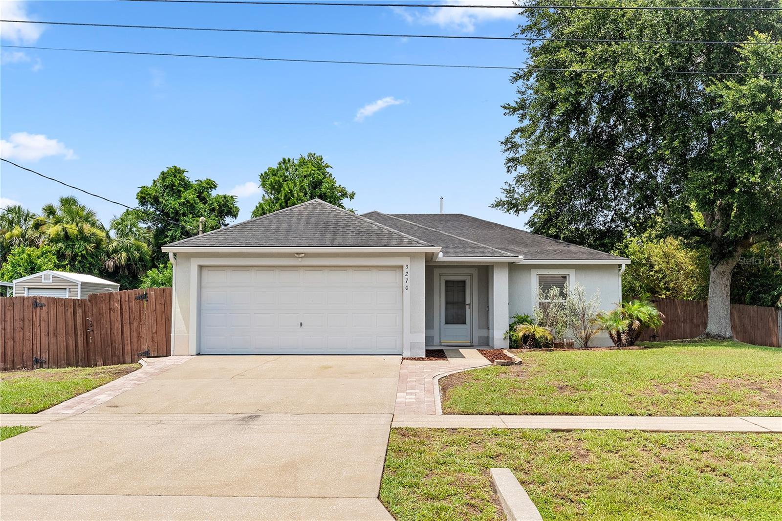 Welcome home to this beautifully updated and meticulously maintained 3-bedroom, 2-bath residence, offering the perfect combination of comfort, style, and functionality. Whether you’re searching for your first home, looking to downsize, or adding a turnkey property to your investment portfolio, this home presents an exceptional opportunity. Designed with a desirable split floor plan, the home offers both privacy and functionality. Fresh interior paint, stainless steel appliances, and thoughtfully updated living spaces create a bright, inviting atmosphere, while the spacious primary suite serves as a peaceful retreat with a large walk-in closet and a relaxing garden soaking tub. Step outside to your private, fully fenced backyard and enjoy your own backyard oasis. The sparkling pool and covered patio provide the perfect setting for entertaining guests, hosting family gatherings, or simply relaxing while the kids splash and play. This is Florida living at its finest. Enjoy added peace of mind knowing the major updates have already been completed, including a roof replaced in 2019 and a newer pool pump. With a very low HOA, you’ll enjoy all the benefits of a well-maintained community without the high monthly fees. Move-in ready and thoughtfully updated, this home truly checks all the boxes with its ideal layout, modern updates, private outdoor living space, and unbeatable value. Schedule your private showing today- this one won’t last long!