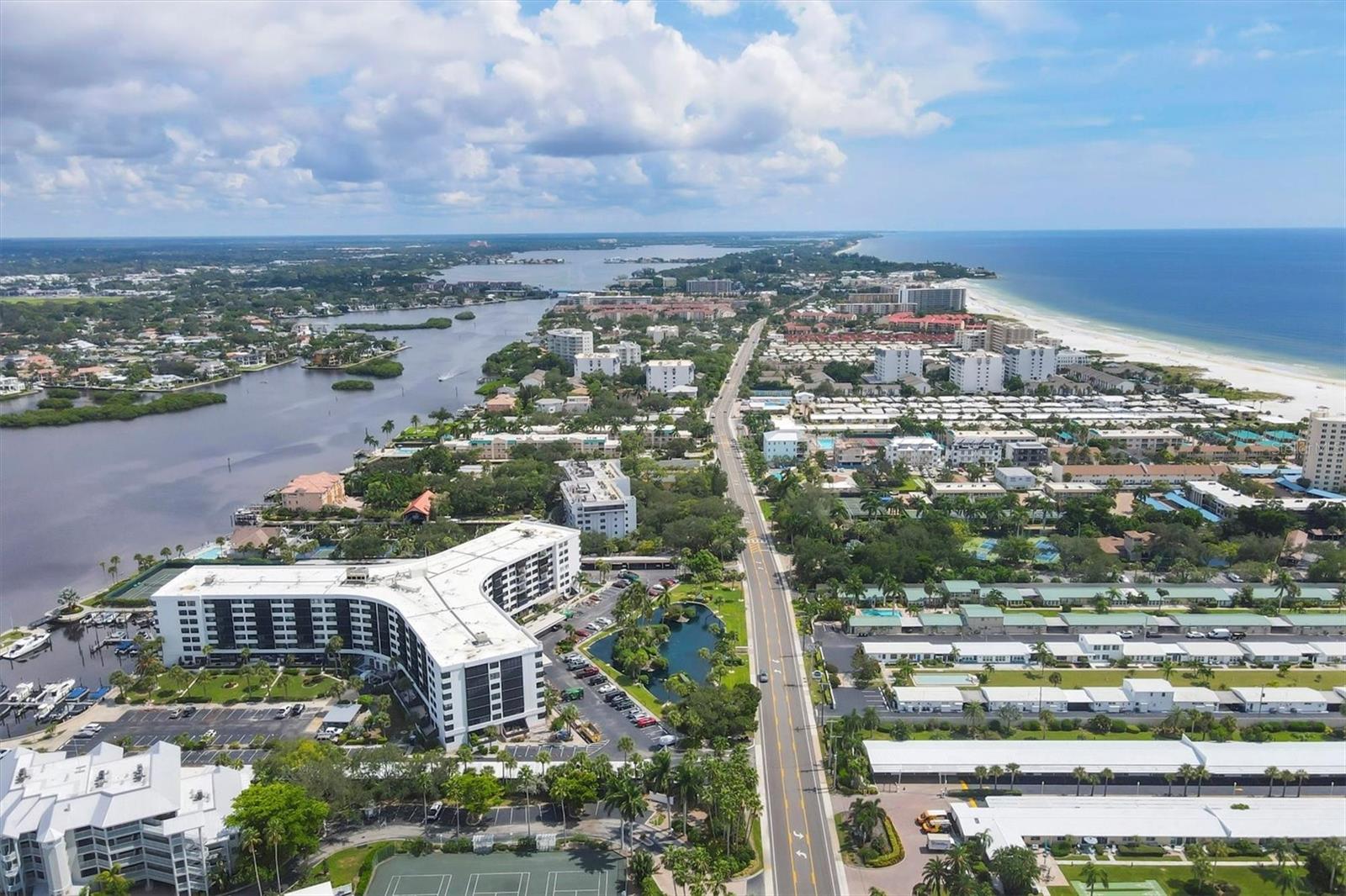Location, location & views! Enjoy and experience luxury living at the Harbor Towers located just steps away from the world-famous Siesta Key beach. Highly desirable 4th floor unit, 2BR/2BTH with spectacular Gulf of America views from every room. Fully updated unit with new windows, new pipes, quartz countertops, new kitchen cabinets doors, new bathrooms and luxury vinyl flooring throughout. This turnkey furnished condo features an open floor plan, two suites split plan bedrooms and provides one parking space & additional storage room. New electrical panel and new water heater. Delight yourself at the HT amenities including heated resort style pools, 3 Har-Tru tennis courts, fitness center, sauna, clubhouse and a superb Marina & seating along the intercoastal waterway. HT has newly renovated building facade, common area including the lobby, spa area and hallways. A fantastic investment opportunity to own a rental income while enjoying the unit whenever you wish. Two-week minimum rentals are allowed 26 times/ year. Buyer can use the on-site property management company for rentals, or others.