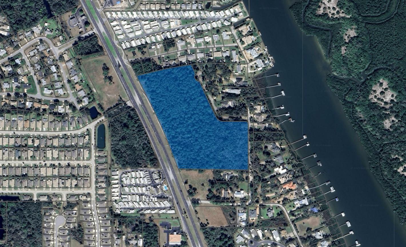 Under contract-accepting backup offers. Prime commercial development site with 1,000 feet frontage on US 1. 14.5 AC mixed zoning: B3 (8.03 ac) / R1 (4.41 ac) / Conservation Easement (2.01 ac). Rear R1 zoned area can be used for stormwater management. Water available and sewer nearby.