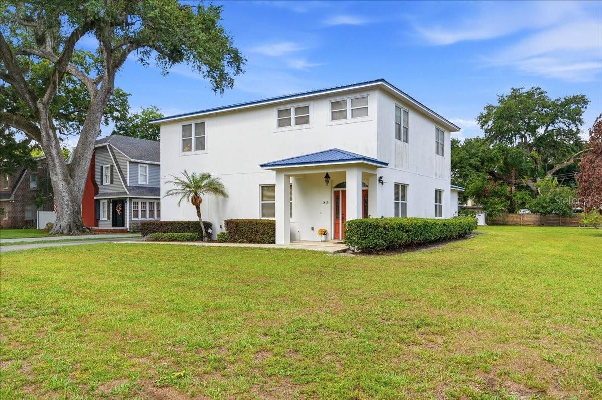Welcome home to this spacious and beautifully designed 3-bedroom, 2.5-bath, two-story residence situated on an oversized .36-acre lot in one of Lakeland's most desirable locations. Less than a 1/2 mile from Lake Hollingsworth, you'll enjoy convenient access to walking paths around the lake, parks, Florida Southern College, Publix, dining, and all the charm this area has to offer.

Step inside to discover a large front living room filled with natural light, providing the perfect space for entertaining or relaxing. The open-concept kitchen and dining area create an inviting atmosphere for gatherings and everyday living, while the oversized pantry offers exceptional storage and organization.  Have peace of mind with a new downstairs HVAC that was installed 10/25 and carries a 10 year warranty.

The primary suite is conveniently located on the first floor, offering privacy and comfort with easy access to the main living areas. Upstairs, you'll find two additional bedrooms and a versatile loft space that can be used as a home office, media room, playroom, or additional living area.

Outside, the expansive .36-acre lot provides plenty of room for outdoor activities, gardening, or future additions. You will also enjoy the various fruit trees! With its functional floor plan, generous living spaces, and prime location near Lake Hollingsworth, this home offers the perfect blend of comfort, convenience, and lifestyle.

Schedule your private showing today!  The .36 acre vacant lot next door is available to purchase together or separate.