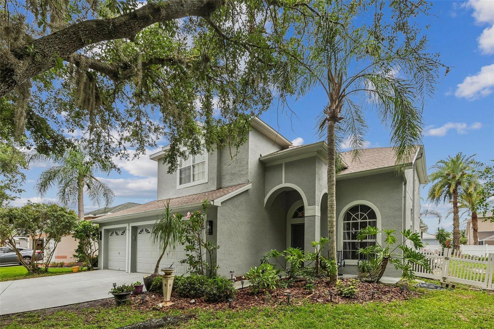 Welcome to the best home in the neighborhood for your active lifestyle at the end of your quiet cul-de-sac against conservation area.  Whether enjoying the beautiful tropical pool with rock waterfall,  grilling and playing volleyball in the pool  with family or neighbors, playing in the big side yard or just unwinding from a long day -- you will love this for your next home. 
Welcome to Newcastle..a great gated neighborhood in the highly sought after Westchester subdivisions in the greater Westchase area.  Rated one of the best subdivision areas in Florida.  A great family bubble area of NW Tampa with low crime, great schools and plenty to safely do close by.  (parks, golf, bike, shop with 10 minutes) .
This renovated 6 bedroom, 3 full bath, 3 car garage pool home with waterfall, jacuzzi, and an added on 45 x 12 back porch for games, ping pong or pool and staying out of the sun all backdropped by palm trees for your private resort oasis.  Sit by the gas firepit with family and friends or come inside to an open concept space for great daily living with large kitchen with stainless steel appliances, gas range, new dishwasher, solid wood cabinets with quartz countertops with matching island for eating and conversation that looks straight into the family room with built in bookcase, electric fireplace and  large screen TV. From the front door you enter the formal living room and dining room, that flows to the family room and kitchen.  The first floor also has a guest bedroom and full bath off the pool, a laundry room between kitchen and garage with new washer and a dryer both staying.  The main floor is all hardwood floors and tile.  The second floor at one end of hall has 3 bedrooms, or make one an office or owner can convert to a 2nd large walk in closet off adjoining master bedroom.
 Two of the bedrooms have new carpet, (will add 3rd if desired), Other end of hall has the second full bath with shower and a large rec room for pool table, gaming or a large bedroom with new carpet.  In the middle of upstairs hall is the master bedroom and bathroom.   The master has plenty of room for a king size bed, has walk in closet and 2nd closet.  The master bathroom off the bedroom has a double vanity and gorgeous double shower that makes getting up for work a little easier.
Home has a New roof is 2024, New 5 ton AC 2021, pool salt system, pool filter 2024, whole house water softener
This area is convenient to restaurants, malls, airports, the best beaches, theatre and championship sports teams of Lightning Hockey, Tampa Bay Bucs football and Rays baseball.   Seller is licensed contractor if improvements are desired.