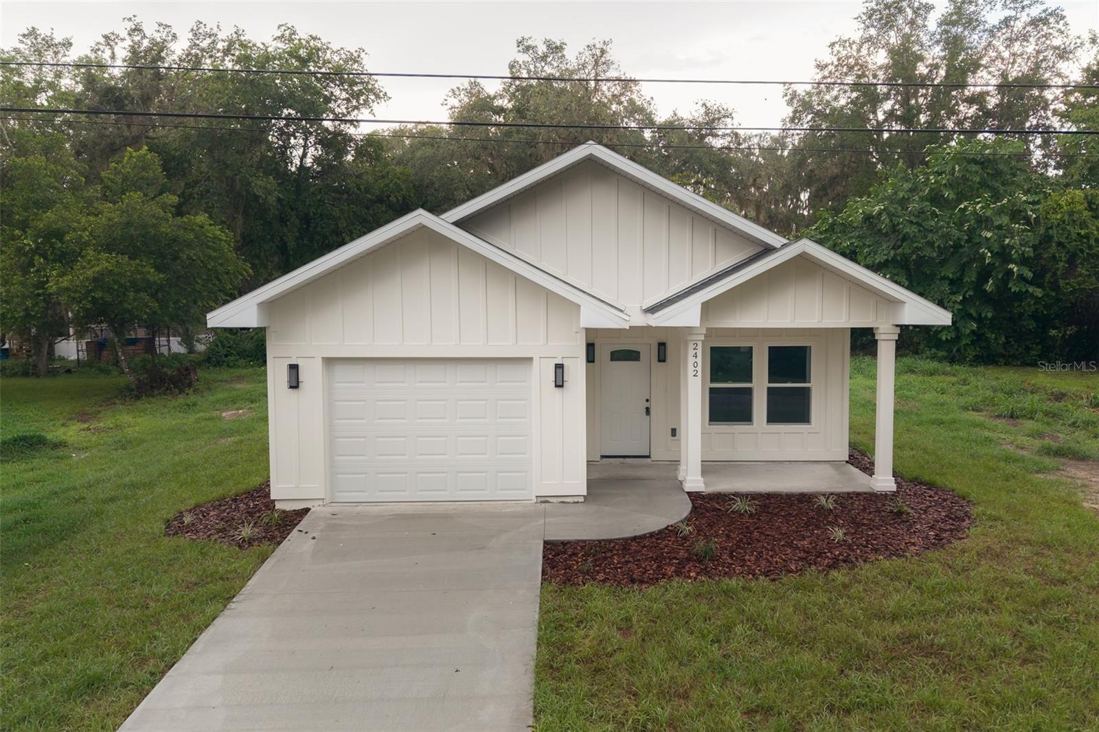 BRAND NEW BUILD! Located in the Copeland community, this 3 bedroom 2 bath was just completed and sits on a roomy .23-acre lot. Upon entering you’ll find an expansive cathedral ceiling, solid surface flooring throughout, and designer fixtures. The large great room connects to the gourmet kitchen with granite counters, sleek shaker cabinetry AND WALK-IN pantry! The master suite is a dream with beautiful tray ceilings, en suite bath with granite double vanities, walk-in shower and oversized walk-in closet with custom built ins. The 2 guest bedrooms are well designed and make use of an impressive guest bath. Other unique features include high efficiency, all double pane windows, airy nine foot ceilings through out, private laundry room, and spacious 1 car garage. You'll be steps to hiking at the local Gum Root Nature Park, Newnan's Lake, and minutes to downtown Gainesville. Call to schedule a tour.